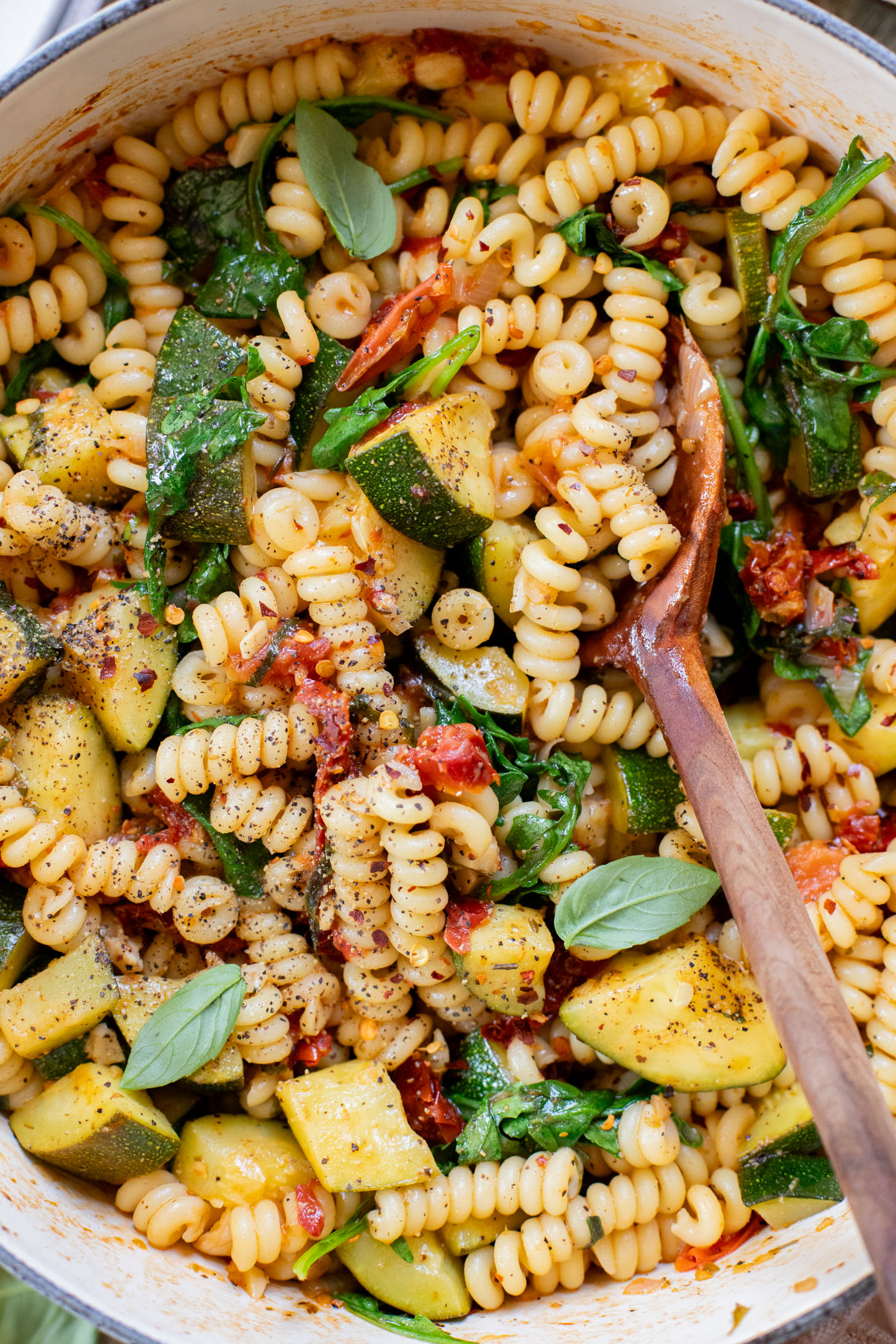 This One-Pot Summer Veggie Pasta is ready in 30 minutes and is filled with zucchini, tomatoes, greens & basil. Simple & delicious vegan pasta | ThisSavoryVegan.com