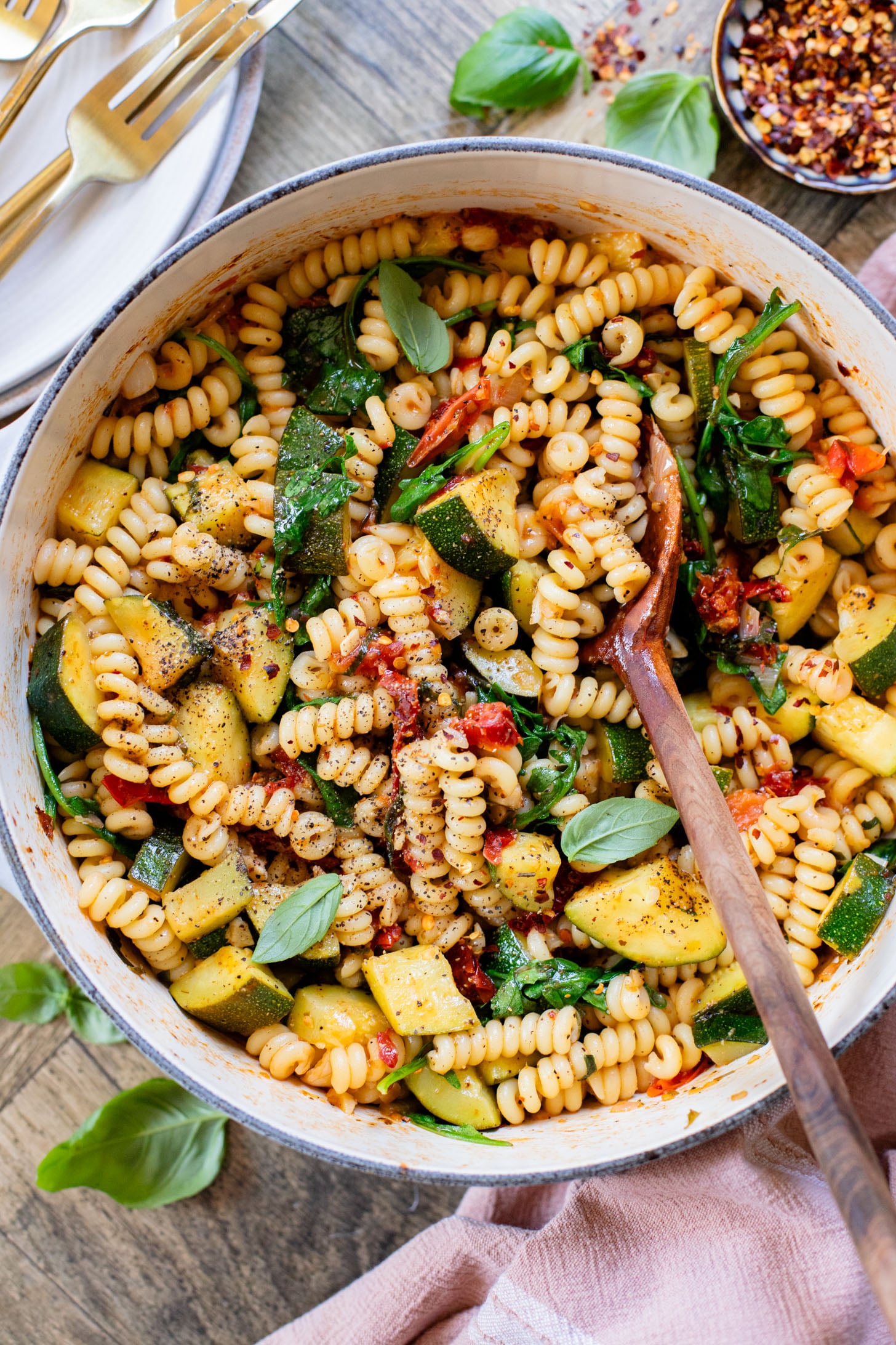 This One-Pot Summer Veggie Pasta is ready in 30 minutes and is filled with zucchini, tomatoes, greens & basil. Simple & delicious vegan pasta | ThisSavoryVegan.com