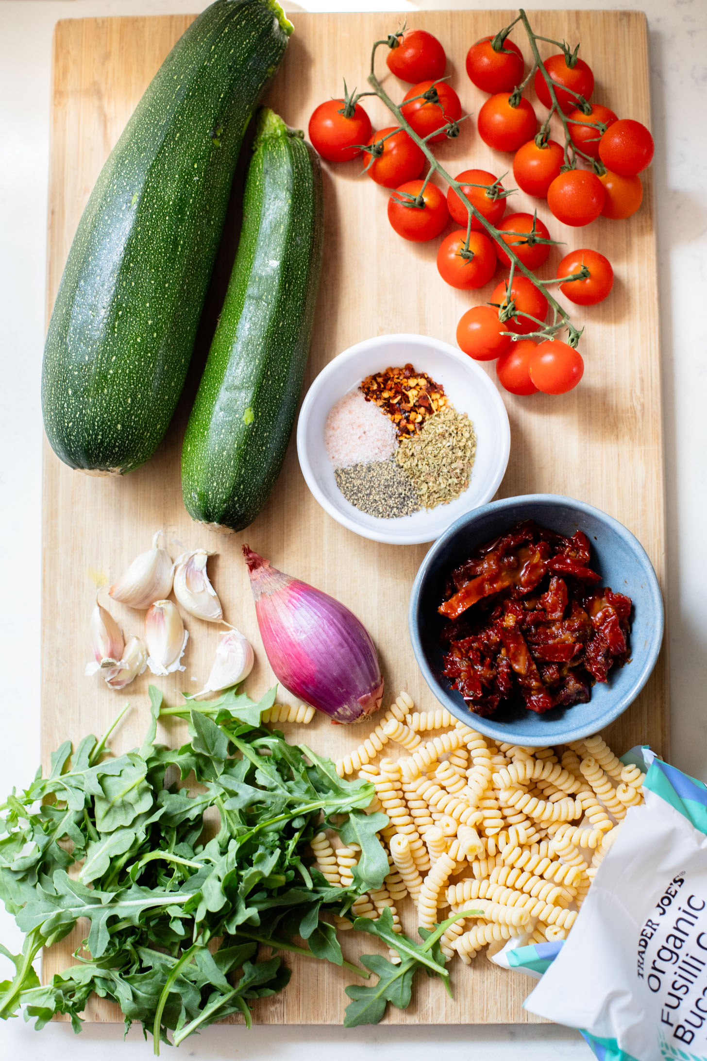 This One-Pot Summer Veggie Pasta is ready in 30 minutes and is filled with zucchini, tomatoes, greens & basil. Simple & delicious vegan pasta | ThisSavoryVegan.com