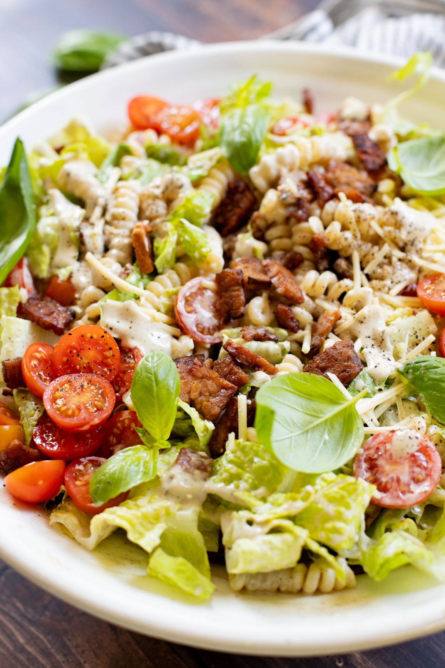 This Vegan BLT Caesar Pasta Salad is the perfect addition to your next picnic or BBQ. Made with the best dairy-free Caesar dressing | ThisSavoryVegan.com