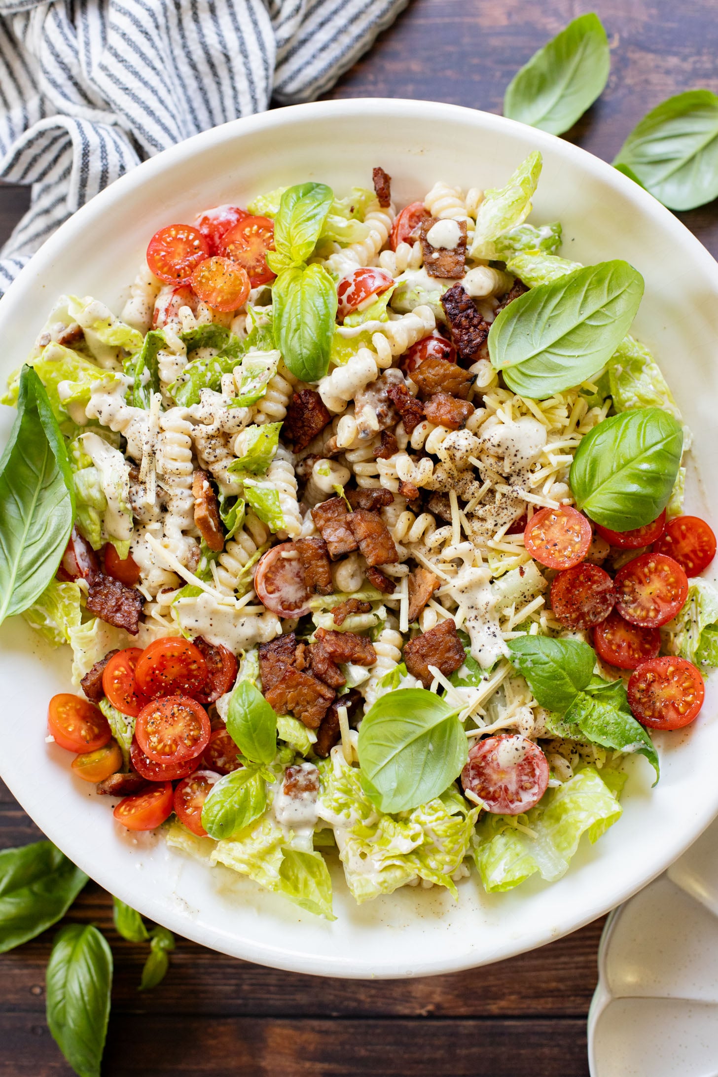 This Vegan BLT Caesar Pasta Salad is the perfect addition to your next picnic or BBQ. Made with the best dairy-free Caesar dressing | ThisSavoryVegan.com