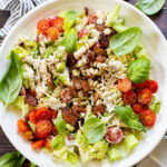 This Vegan BLT Caesar Pasta Salad is the perfect addition to your next picnic or BBQ. Made with the best dairy-free Caesar dressing | ThisSavoryVegan.com