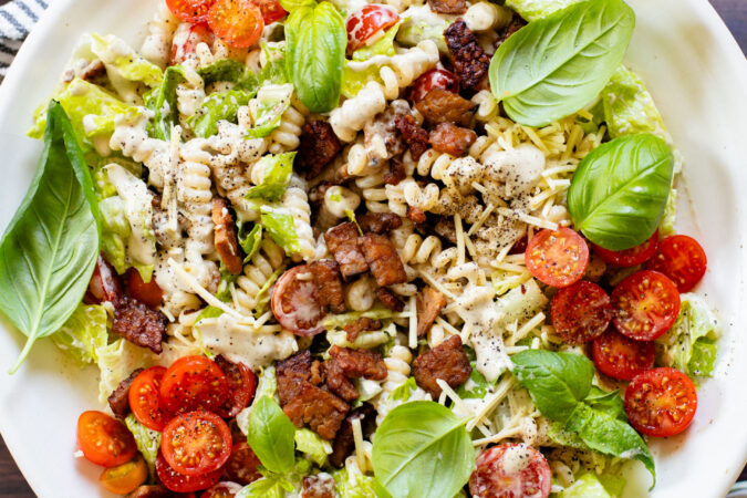 This Vegan BLT Caesar Pasta Salad is the perfect addition to your next picnic or BBQ. Made with the best dairy-free Caesar dressing | ThisSavoryVegan.com