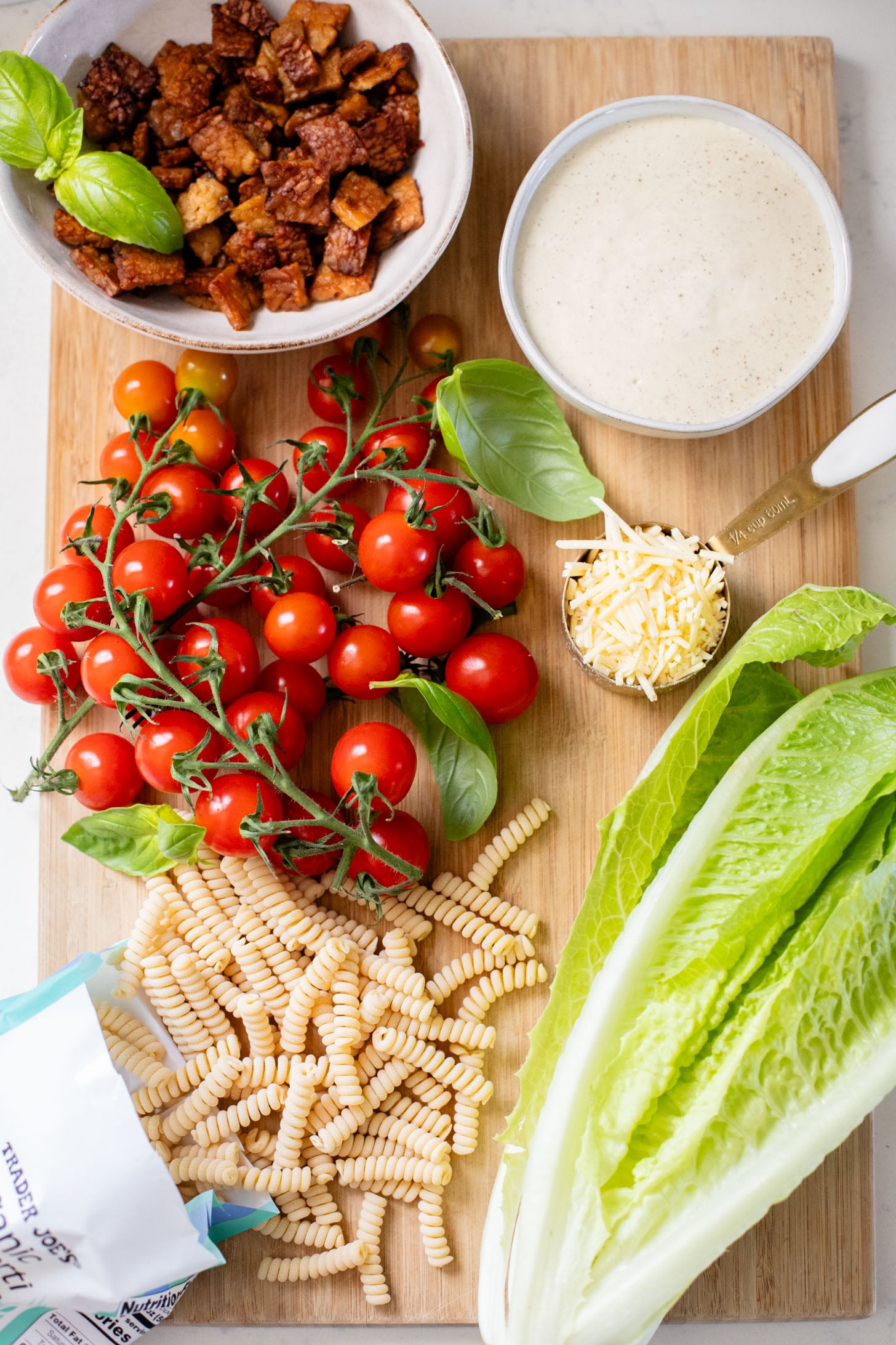 This Vegan BLT Caesar Pasta Salad is the perfect addition to your next picnic or BBQ. Made with the best dairy-free Caesar dressing | ThisSavoryVegan.com