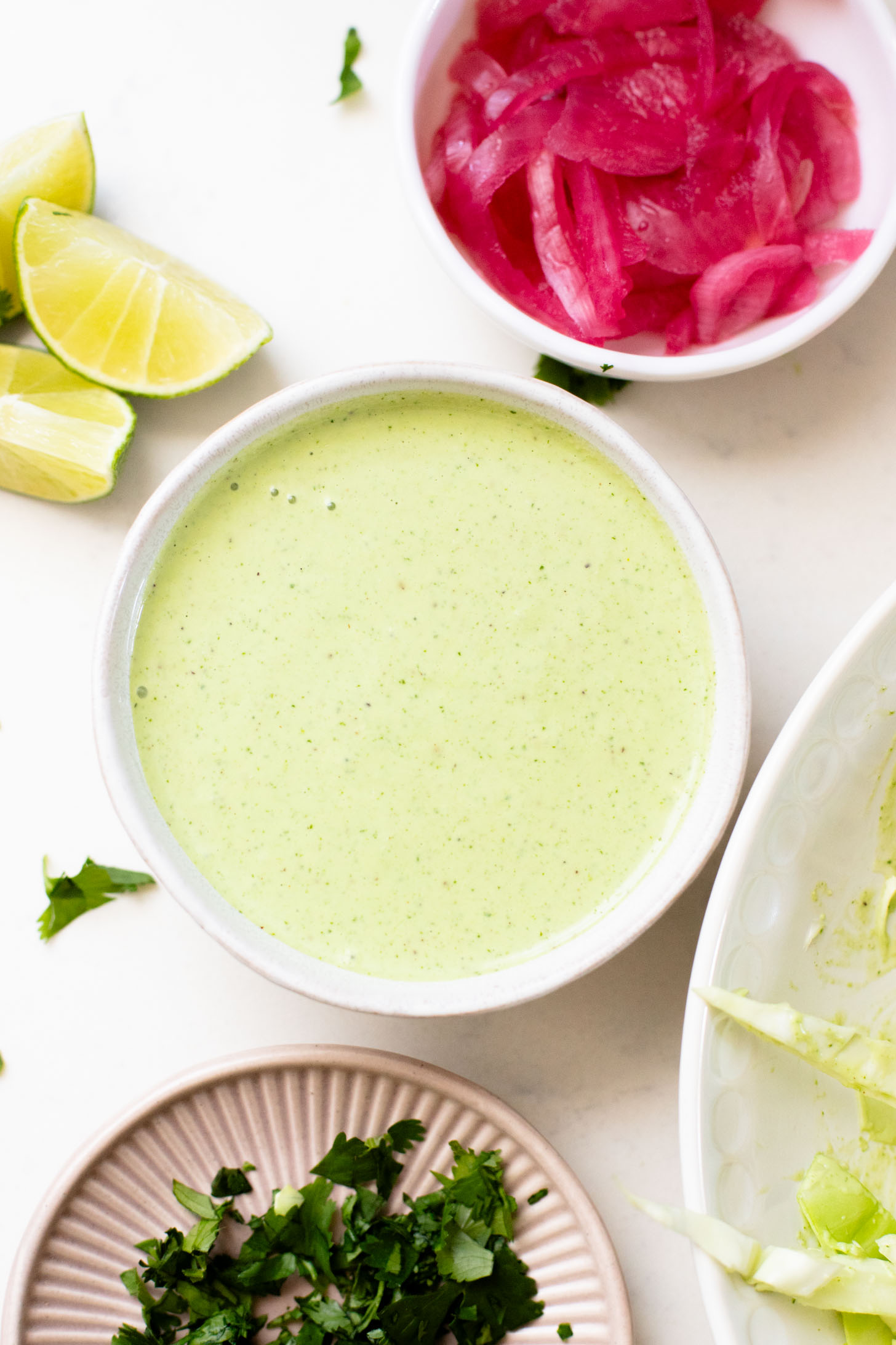 These Vegan Chicken Tacos are a must make! The vegan chicken is smoky & charred and the tacos are topped with a jalapeño cilantro sauce | ThisSavoryVegan.com