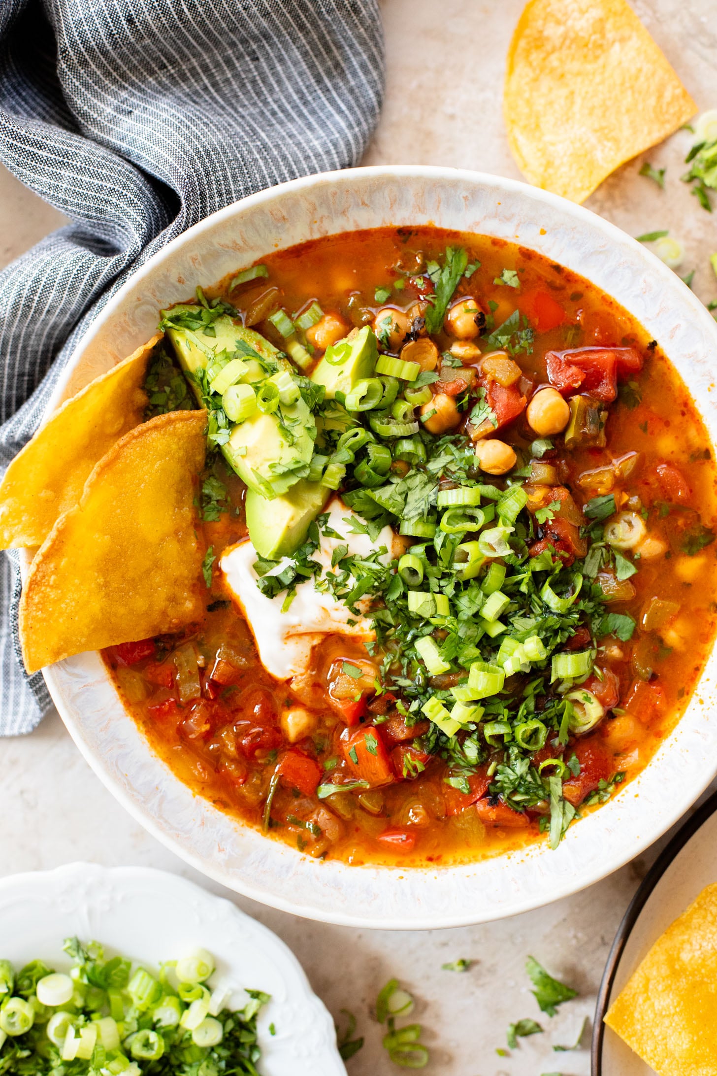 This Chickpea Taco Soup is a simple, clean soup recipe that doesn't skip on flavor. Packed with veggies and plant protein | ThisSavoryVegan.com
