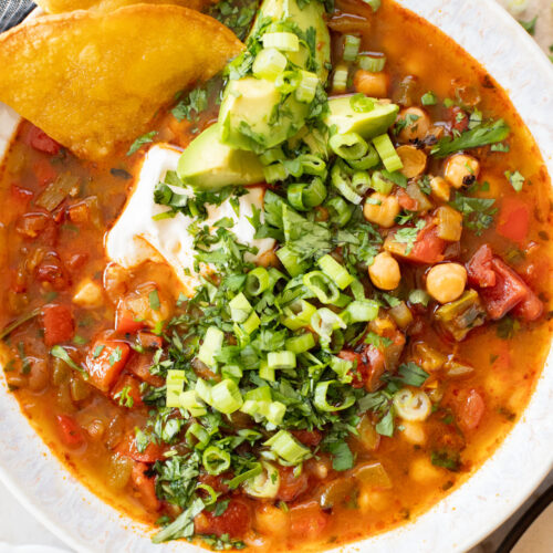This Chickpea Taco Soup is a simple, clean soup recipe that doesn't skip on flavor. Packed with veggies and plant protein | ThisSavoryVegan.com