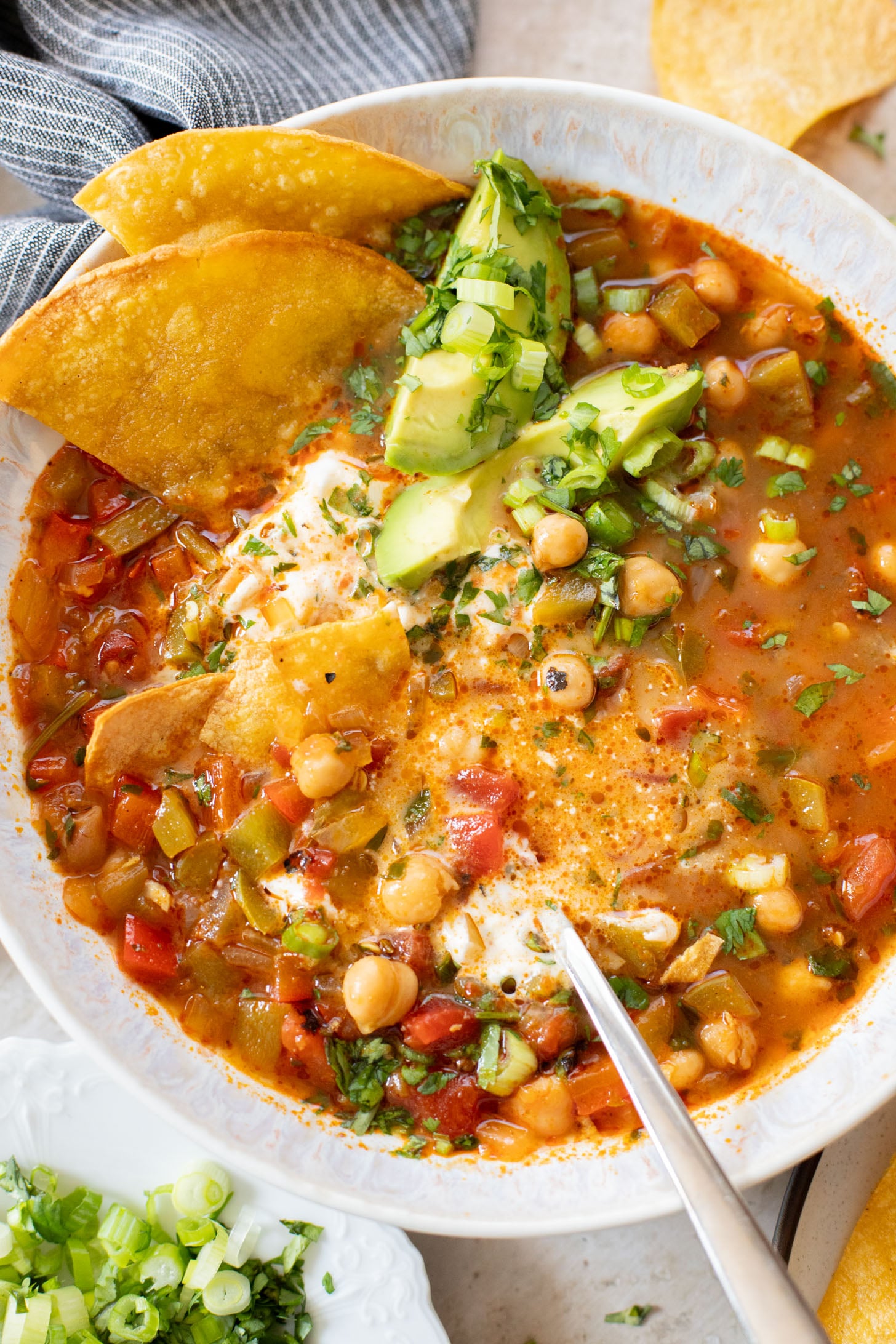 This Chickpea Taco Soup is a simple, clean soup recipe that doesn't skip on flavor. Packed with veggies and plant protein | ThisSavoryVegan.com