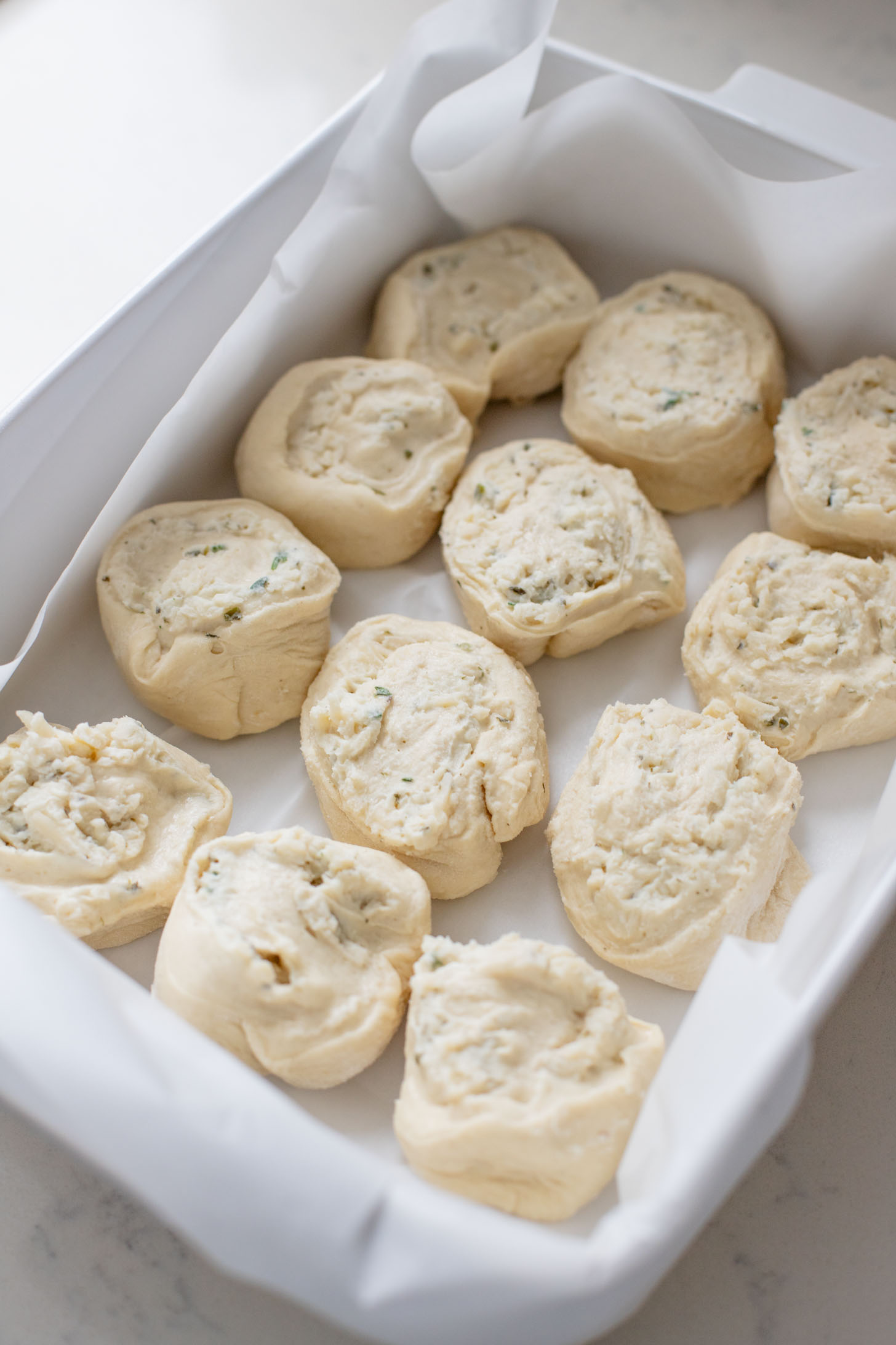 These Cheesy Vegan Swirl Buns are a dairy-free, comforting side dish that are perfect for the holidays! Cheesy, garlicky & delicious | ThisSavoryVegan.com