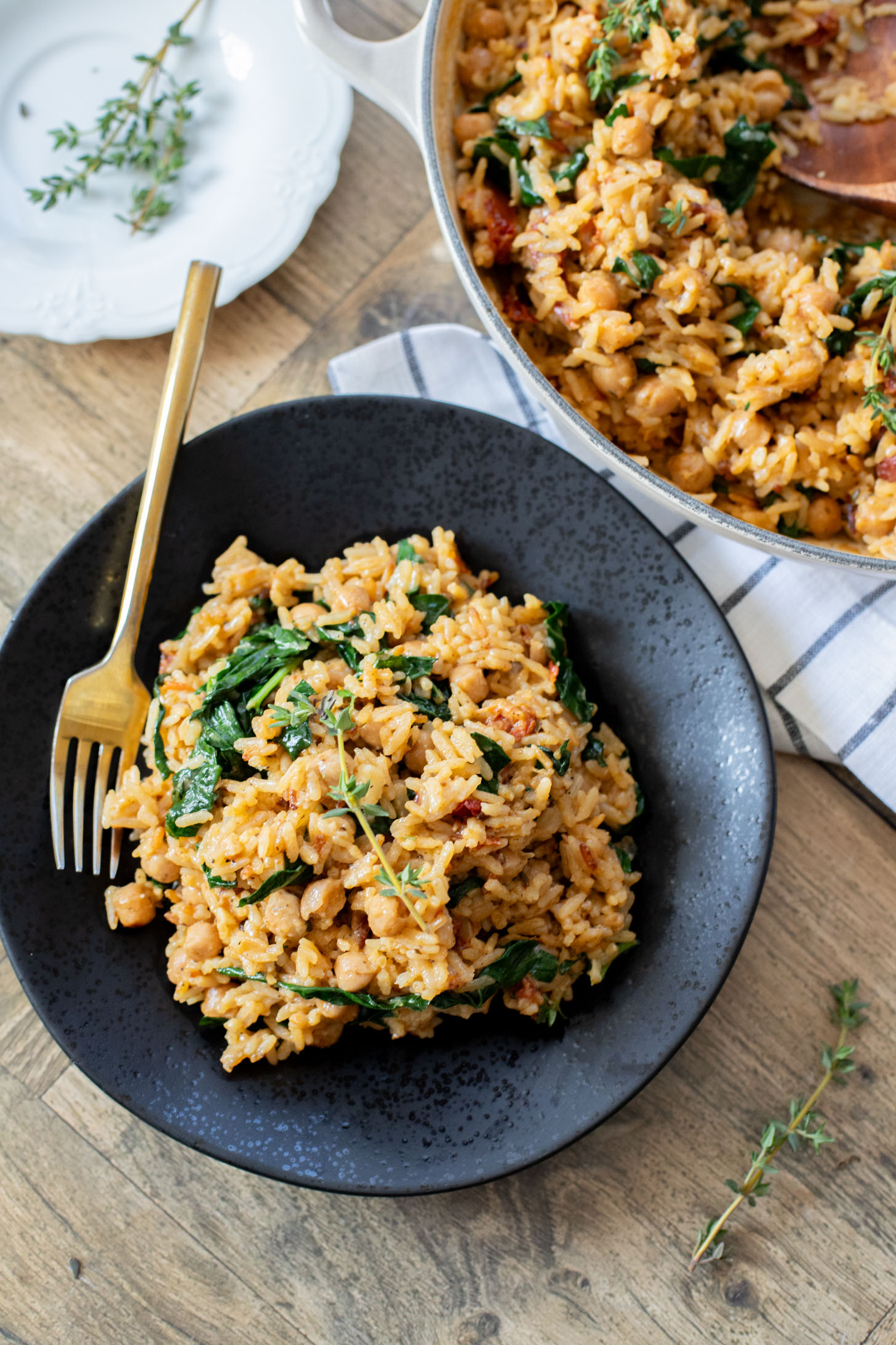 This Creamy Chickpeas & Rice Skillet is a quick and easy plant-based dinner that the whole family will love | ThisSavoryVegan.com