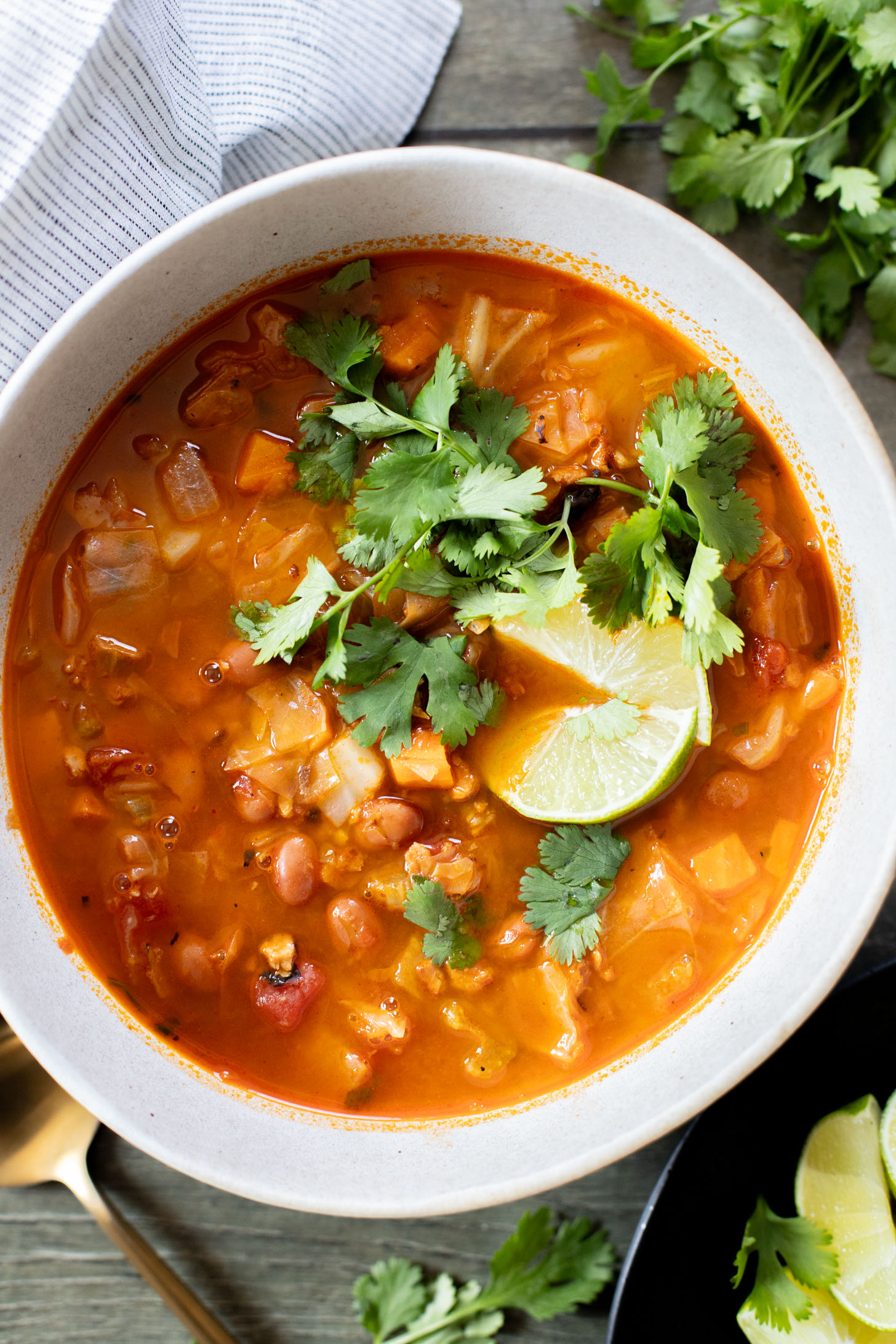 This Smoky Cabbage Soup is a healthy blend of tender cabbage, pinto beans & soy chorizo. Plant-based soup that is easy & delicious | ThisSavoryVegan.com