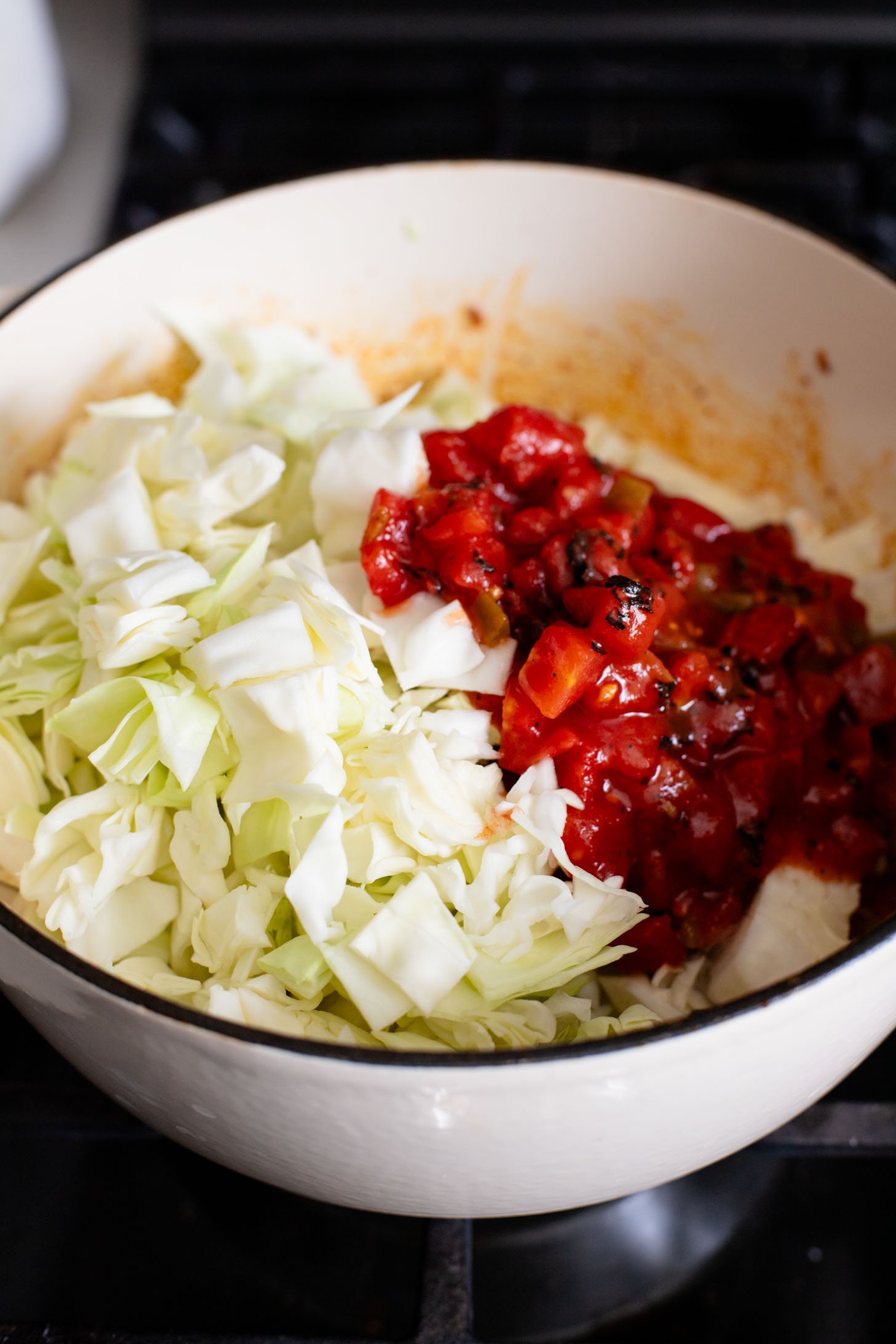 This Smoky Cabbage Soup is a healthy blend of tender cabbage, pinto beans & soy chorizo. Plant-based soup that is easy & delicious | ThisSavoryVegan.com