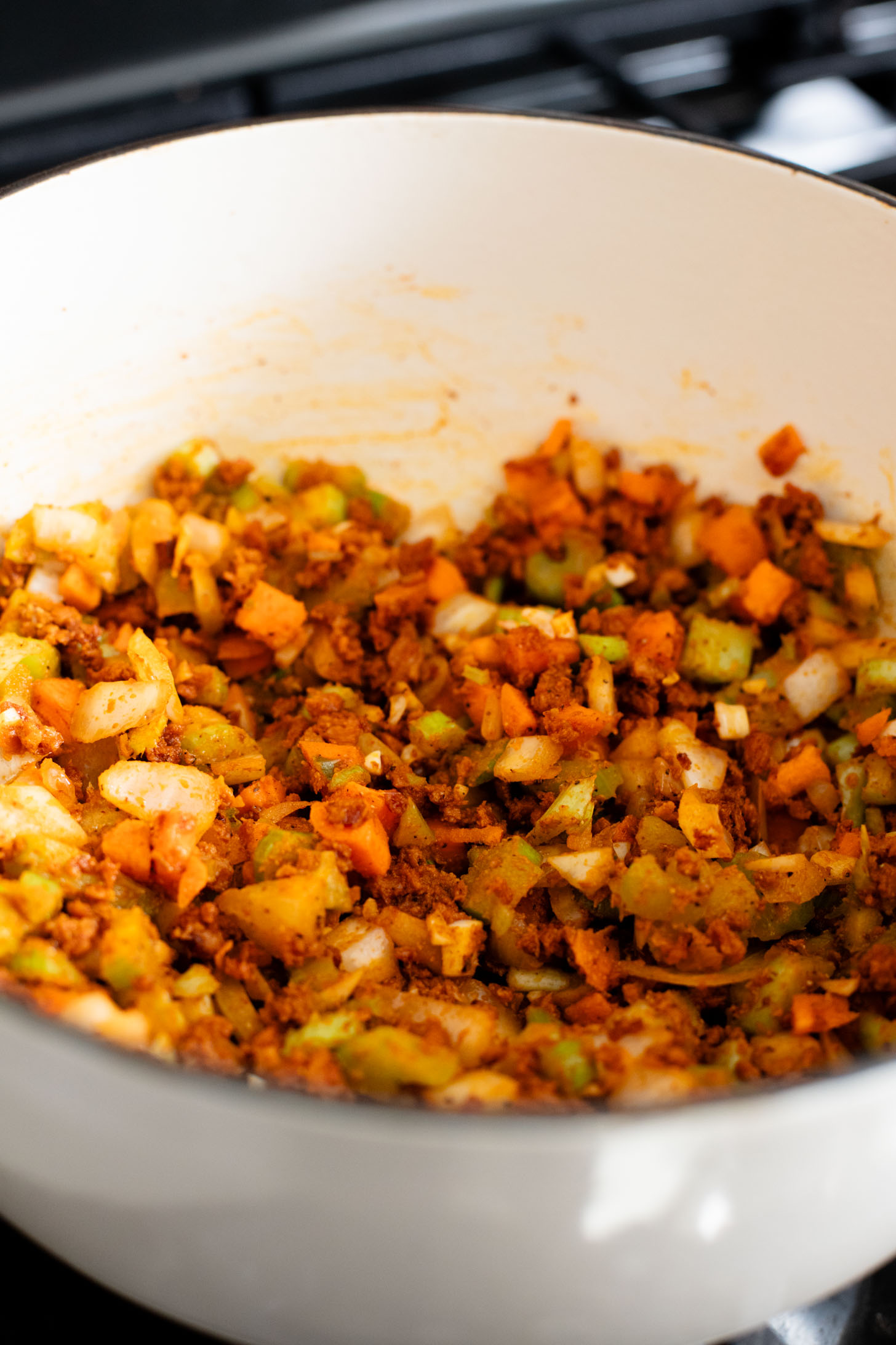This Smoky Cabbage Soup is a healthy blend of tender cabbage, pinto beans & soy chorizo. Plant-based soup that is easy & delicious | ThisSavoryVegan.com