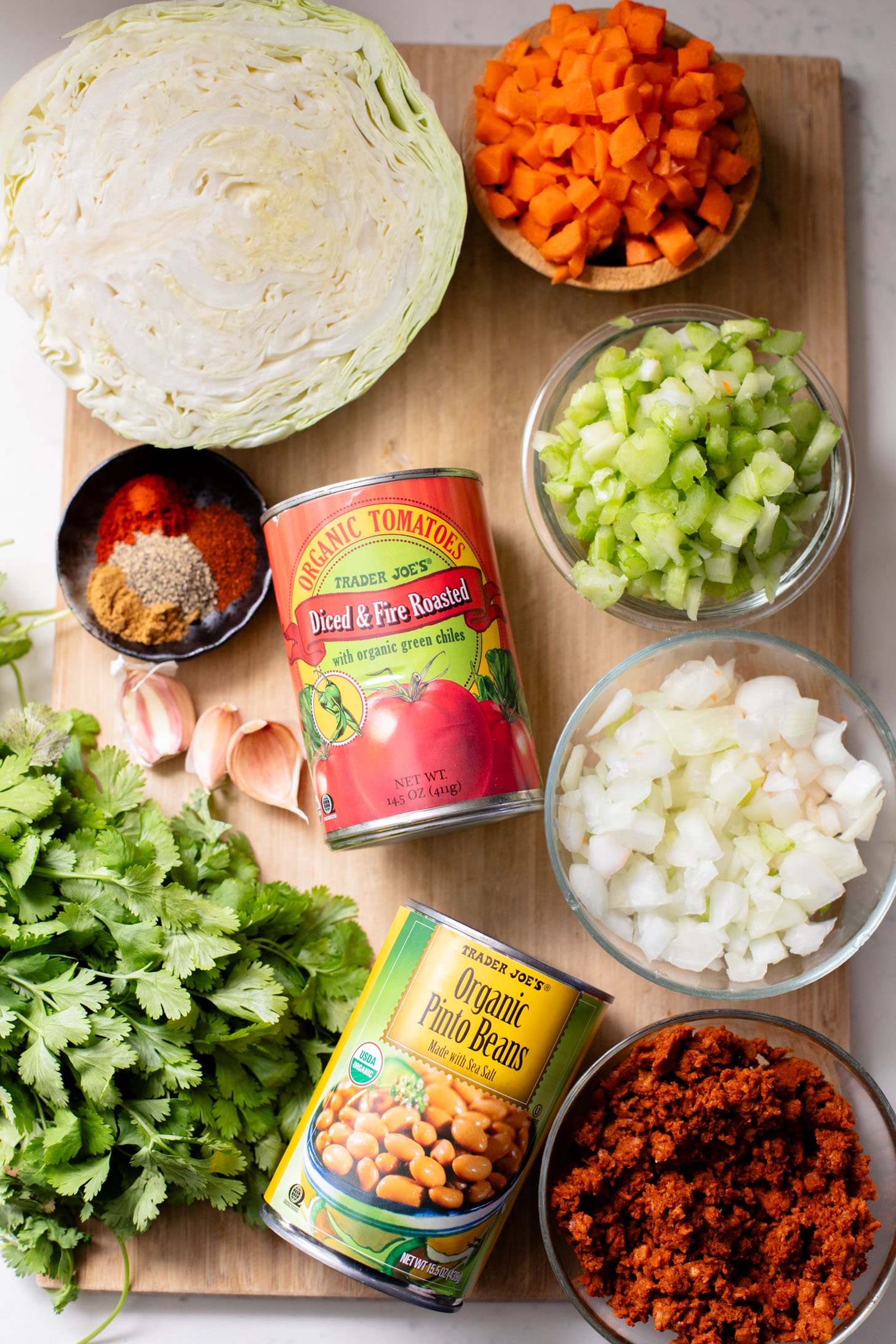 This Smoky Cabbage Soup is a healthy blend of tender cabbage, pinto beans & soy chorizo. Plant-based soup that is easy & delicious | ThisSavoryVegan.com