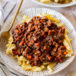 This Sunday Night Mushroom Ragu is the perfect recipe to have on the stove all day. The cooked down mushrooms give this sauce a meaty texture | ThisSavoryVegan.com