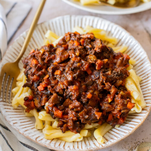 This Sunday Night Mushroom Ragu is the perfect recipe to have on the stove all day. The cooked down mushrooms give this sauce a meaty texture | ThisSavoryVegan.com