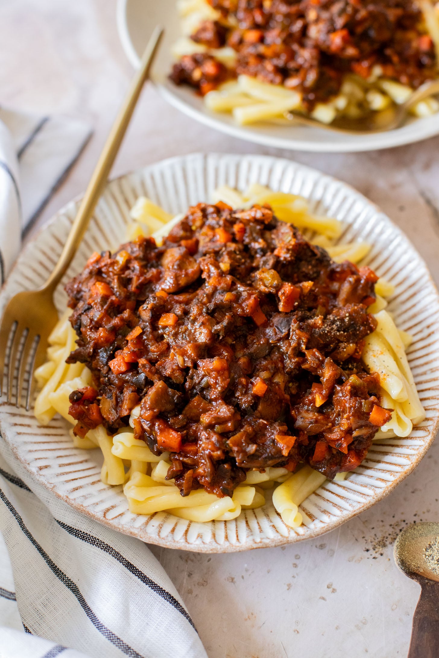This Sunday Night Mushroom Ragu is the perfect recipe to have on the stove all day. The cooked down mushrooms give this sauce a meaty texture | ThisSavoryVegan.com