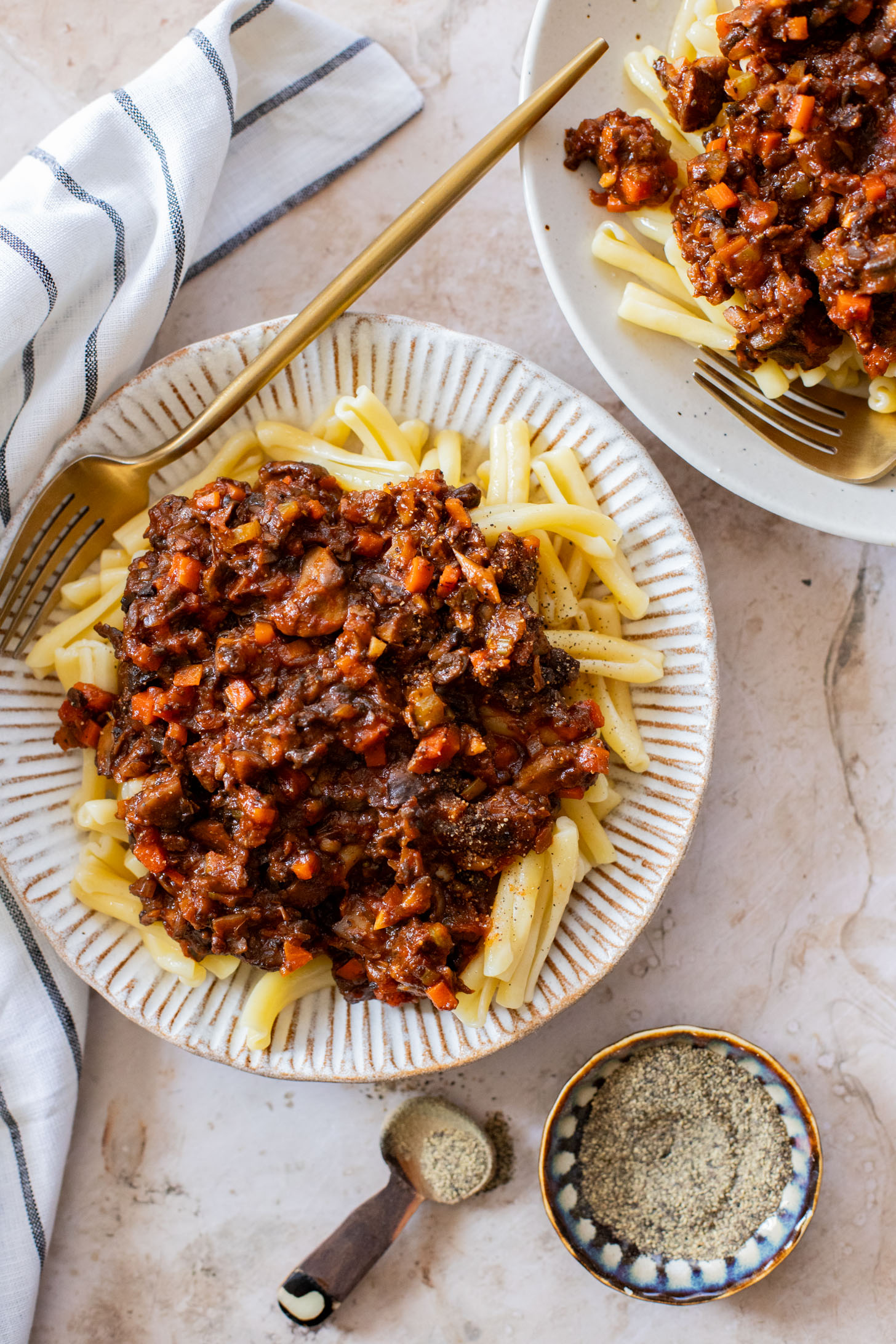 This Sunday Night Mushroom Ragu is the perfect recipe to have on the stove all day. The cooked down mushrooms give this sauce a meaty texture | ThisSavoryVegan.com