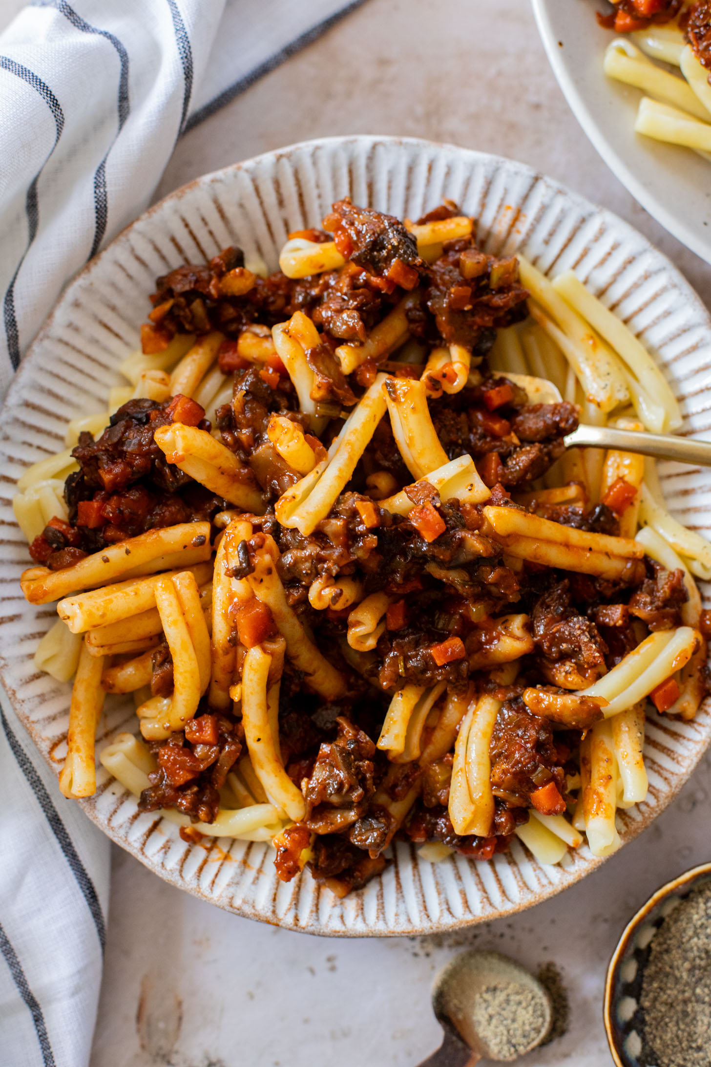 This Sunday Night Mushroom Ragu is the perfect recipe to have on the stove all day. The cooked down mushrooms give this sauce a meaty texture | ThisSavoryVegan.com