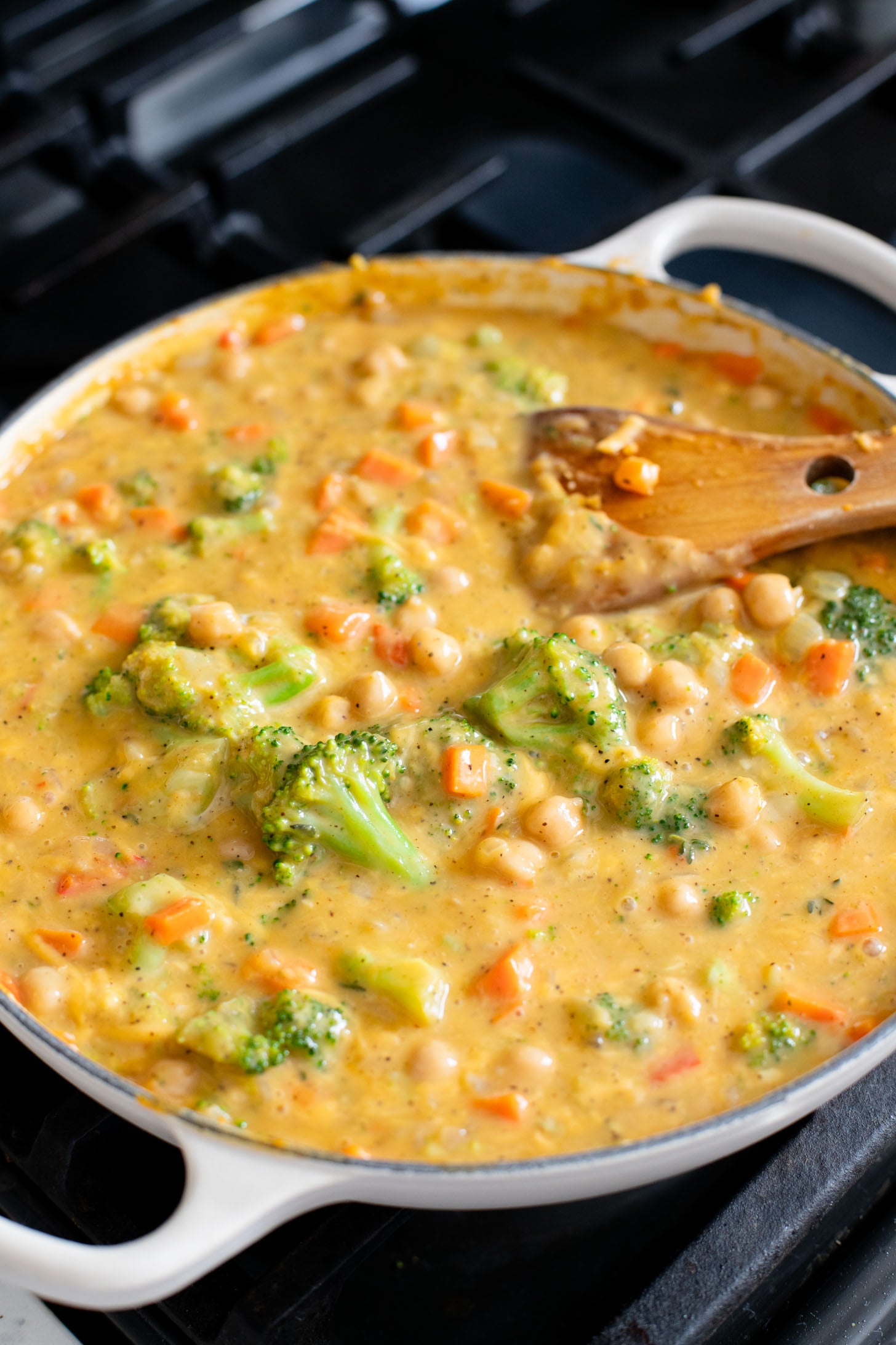 This Broccoli & Cheddar Chickpea Pot Pie is 100% dairy-free and delicious! The perfect comfort meal for the whole family | ThisSavoryVegan.com