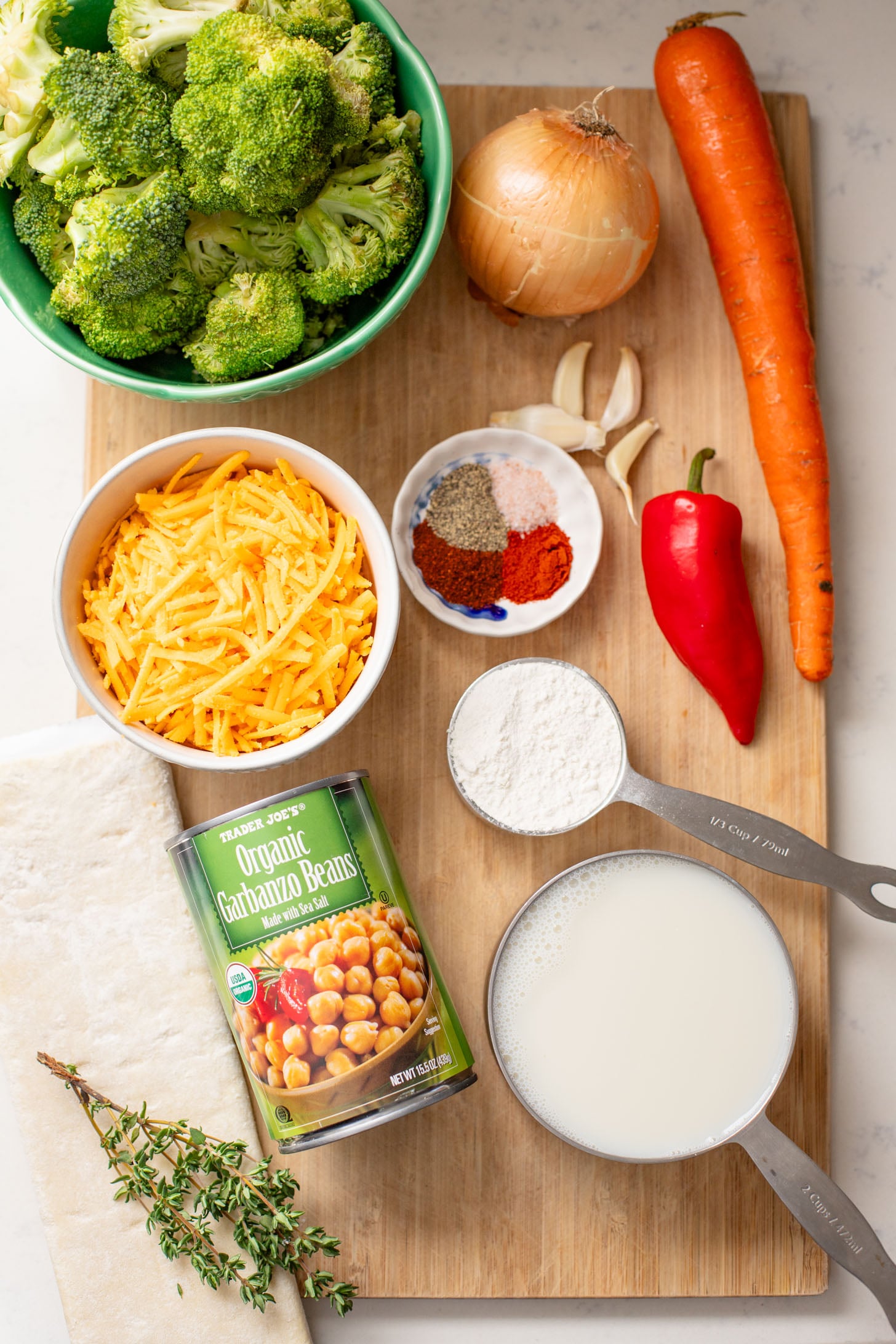 This Broccoli & Cheddar Chickpea Pot Pie is 100% dairy-free and delicious! The perfect comfort meal for the whole family | ThisSavoryVegan.com