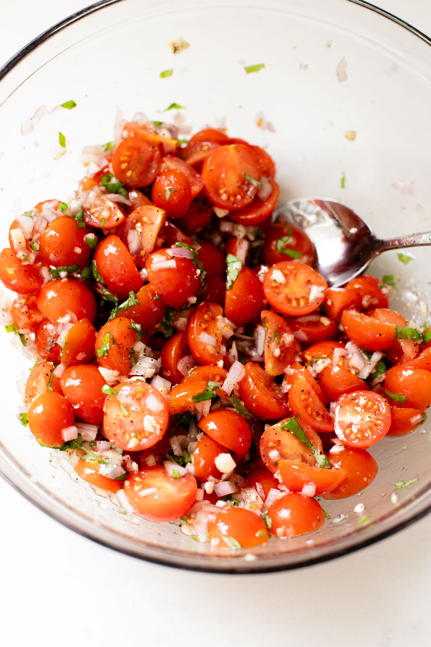 This Christmas Bruschetta Wreath is a holiday party must make appetizer! Made with dairy-free cheese spread, marinated tomatoes & balsamic glaze | ThisSavoryVegan.com