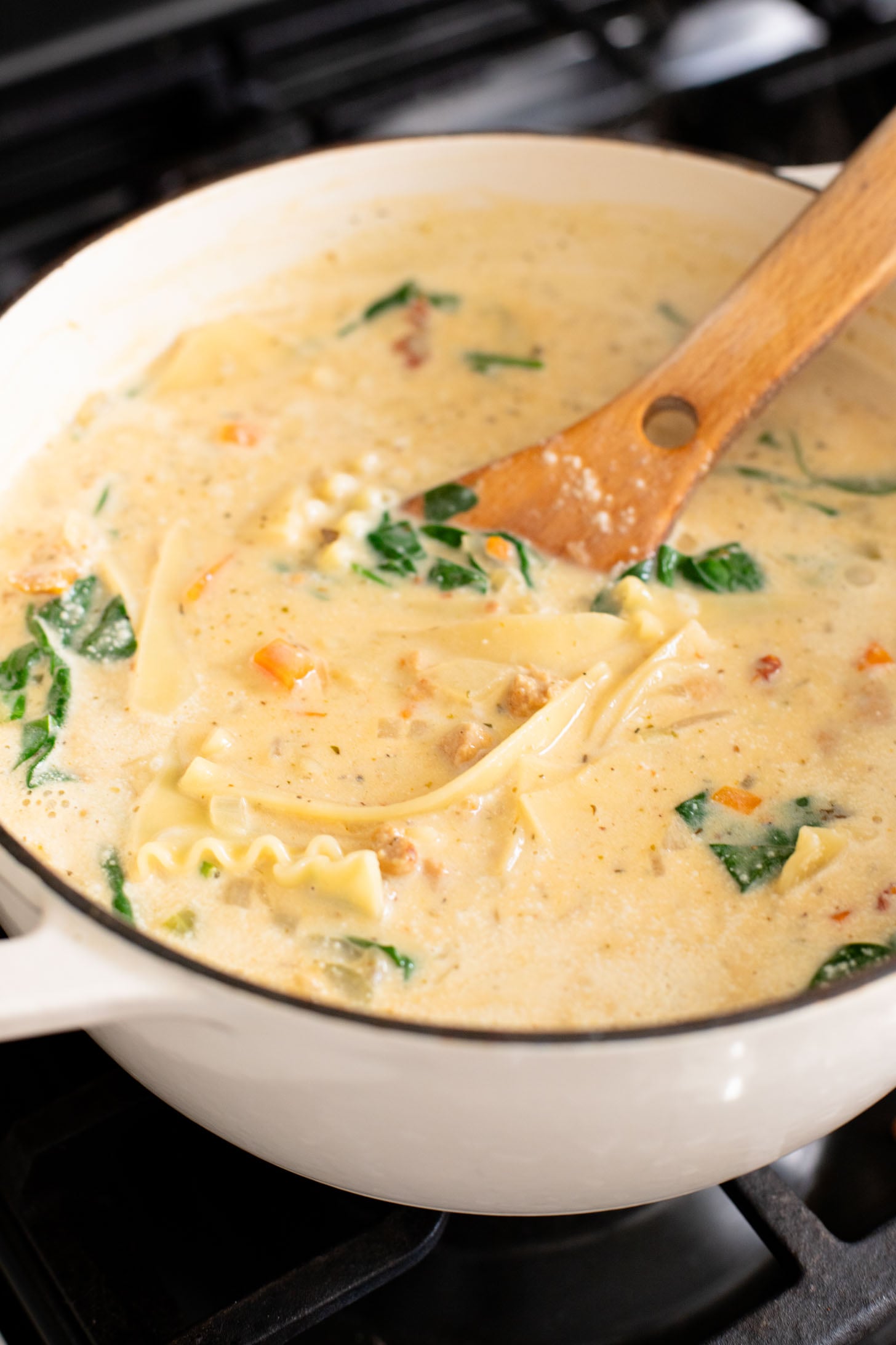 This Creamy Vegan Lasagna Soup is comfort food in a bowl. It is a cozy, one-pot dinner that the whole family will love | ThisSavoryVegan.com