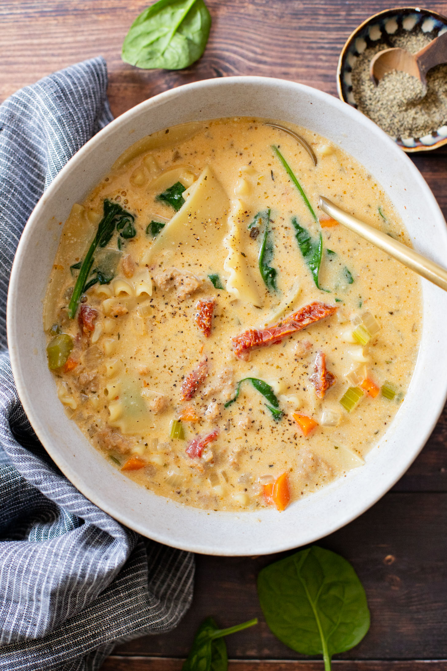This Creamy Vegan Lasagna Soup is comfort food in a bowl. It is a cozy, one-pot dinner that the whole family will love | ThisSavoryVegan.com