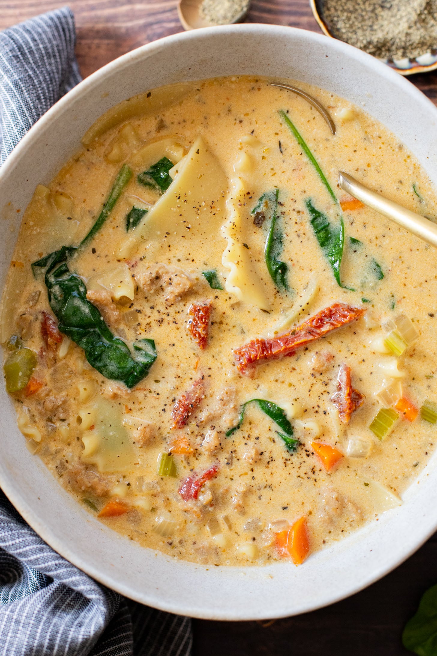 This Creamy Vegan Lasagna Soup is comfort food in a bowl. It is a cozy, one-pot dinner that the whole family will love | ThisSavoryVegan.com