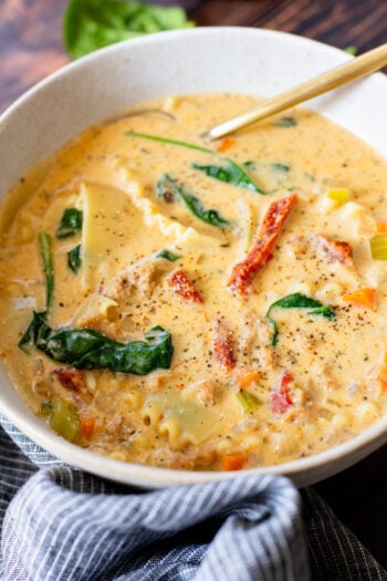 This Creamy Vegan Lasagna Soup is comfort food in a bowl. It is a cozy, one-pot dinner that the whole family will love | ThisSavoryVegan.com