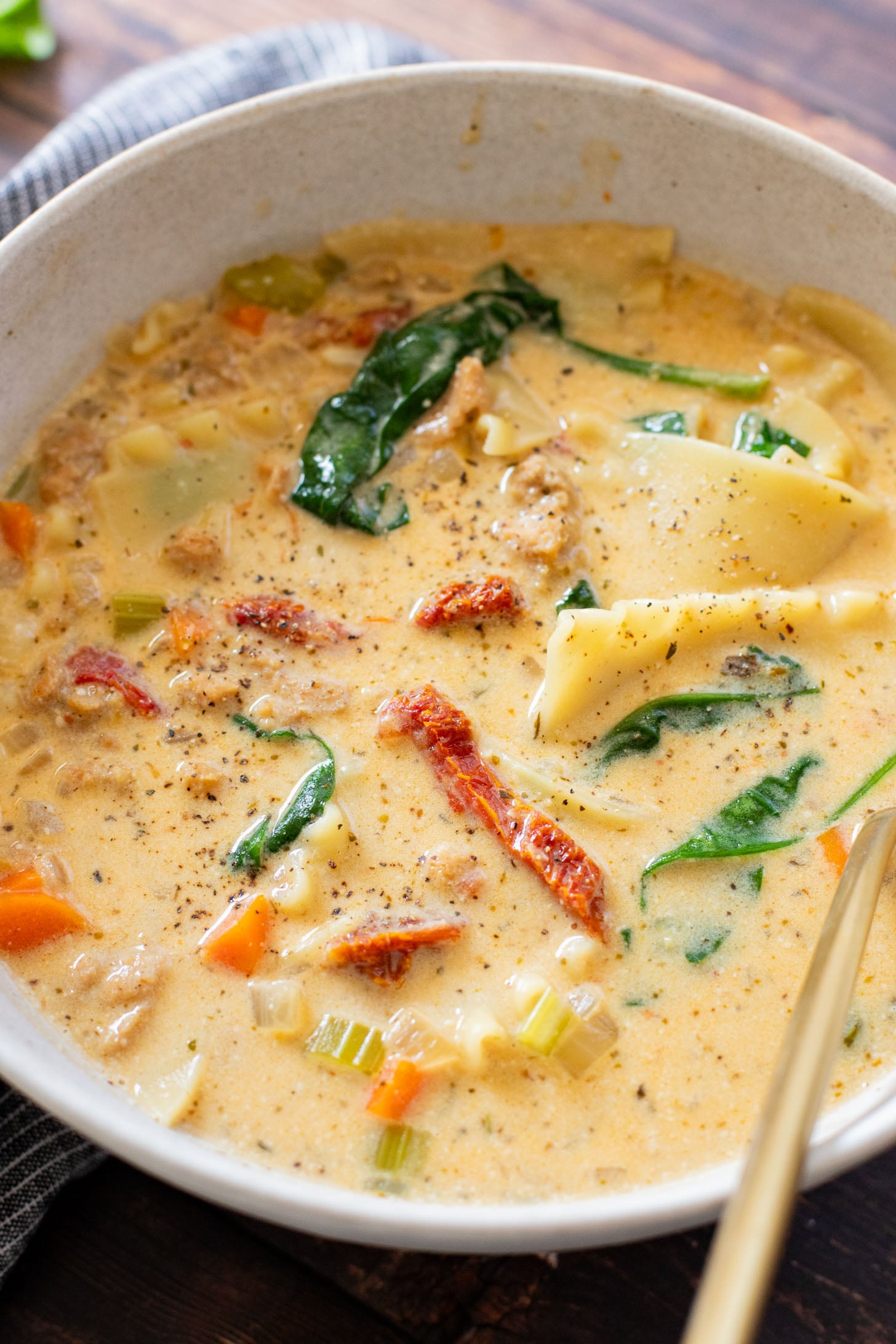 This Creamy Vegan Lasagna Soup is comfort food in a bowl. It is a cozy, one-pot dinner that the whole family will love | ThisSavoryVegan.com