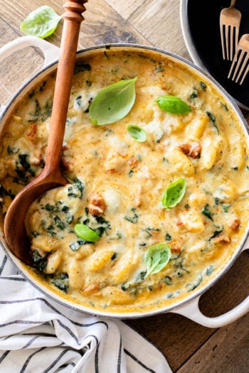 This Vegan Baked Sausage & Kale Gnocchi is a cheesy, comfort food dish. Made in one pot and baked until hot & bubbly | ThisSavoryVegan.com