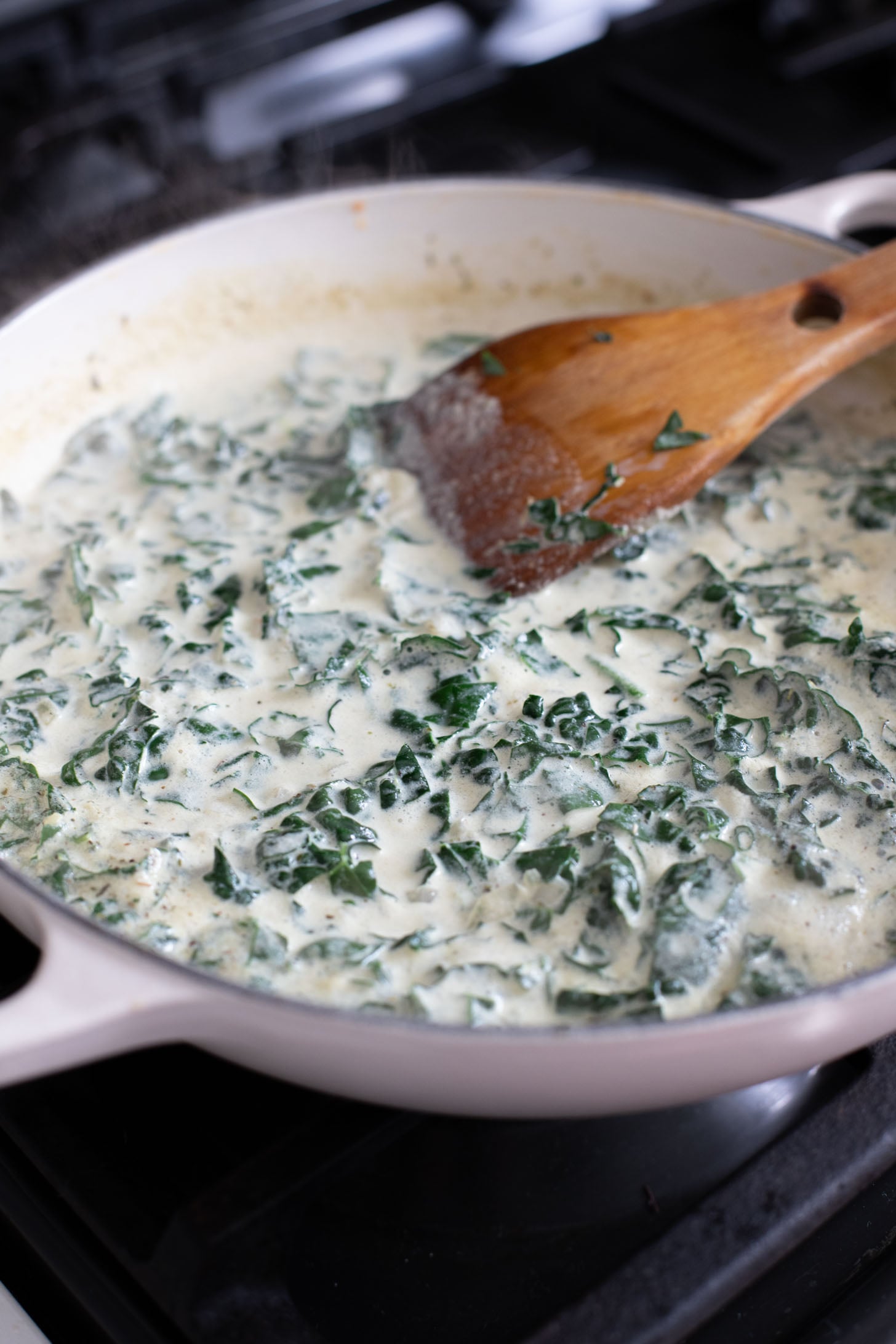 This Vegan Baked Sausage & Kale Gnocchi is a cheesy, comfort food dish. Made in one pot and baked until hot & bubbly | ThisSavoryVegan.com