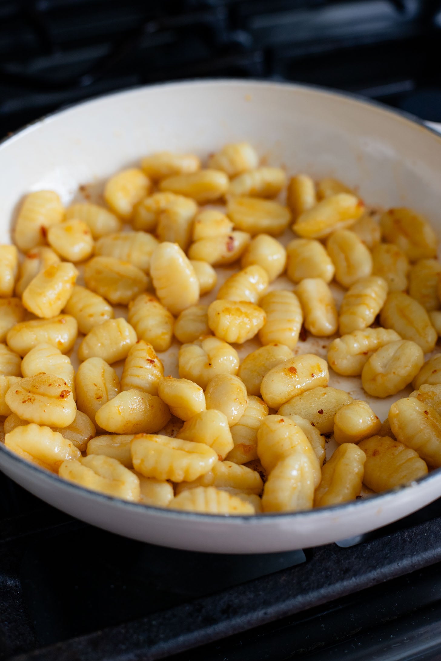 This Vegan Baked Sausage & Kale Gnocchi is a cheesy, comfort food dish. Made in one pot and baked until hot & bubbly | ThisSavoryVegan.com