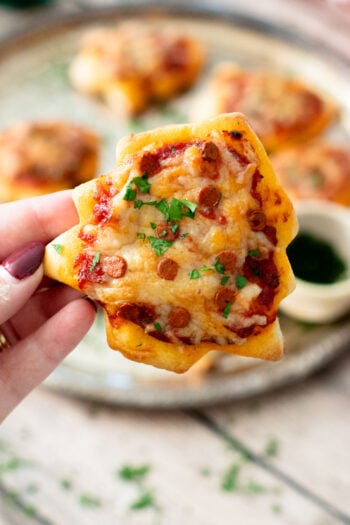 These Mini Christmas Tree Pizzas are a festive holiday recipe that are fun to make and taste amazing | ThisSavoryVegan.com