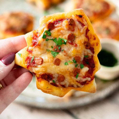 These Mini Christmas Tree Pizzas are a festive holiday recipe that are fun to make and taste amazing | ThisSavoryVegan.com