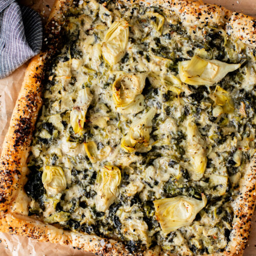 This Spinach Artichoke Tart is a holiday appetizer must make! It is dairy-free and ready in no time - perfect for a party | ThisSavoryVegan.com