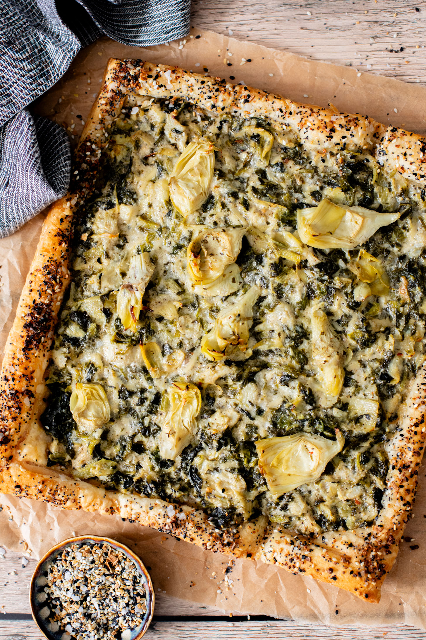This Spinach Artichoke Tart is a holiday appetizer must make! It is dairy-free and ready in no time - perfect for a party | ThisSavoryVegan.com