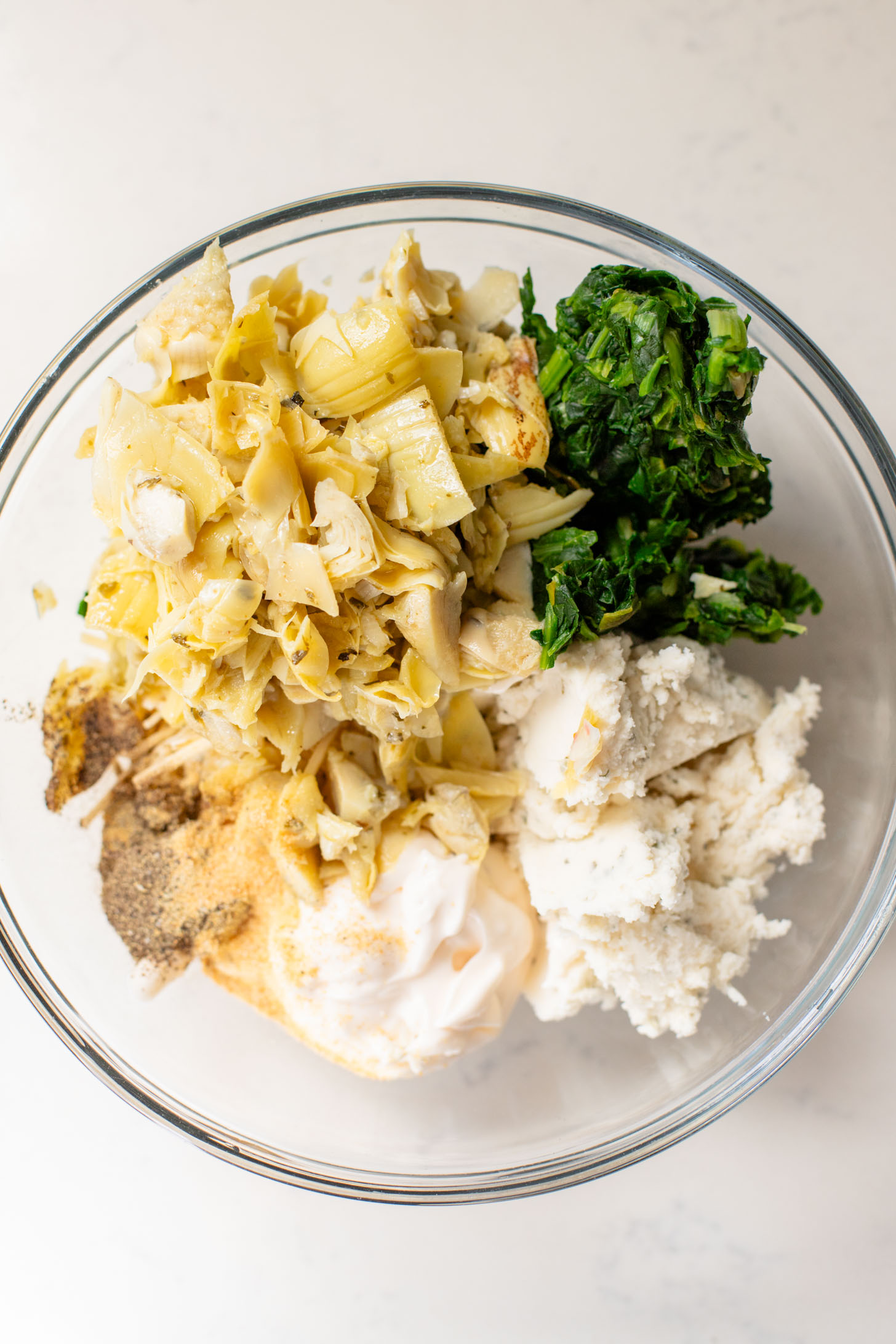 This Spinach Artichoke Tart is a holiday appetizer must make! It is dairy-free and ready in no time - perfect for a party | ThisSavoryVegan.com