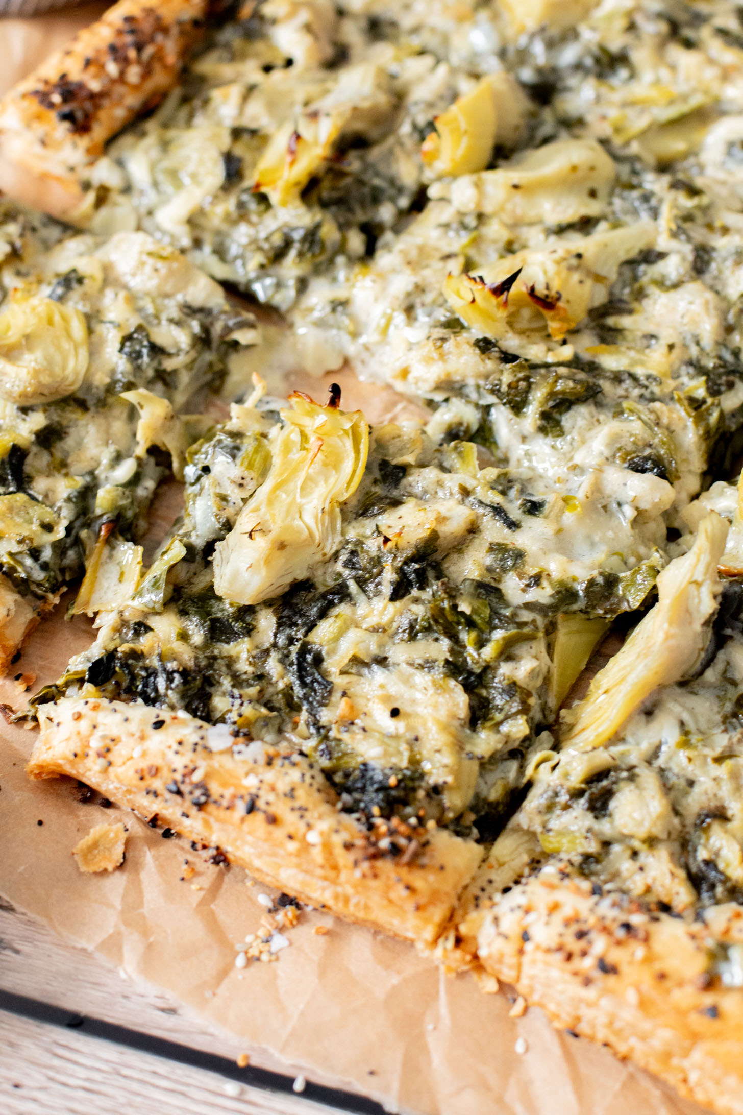 This Spinach Artichoke Tart is a holiday appetizer must make! It is dairy-free and ready in no time - perfect for a party | ThisSavoryVegan.com