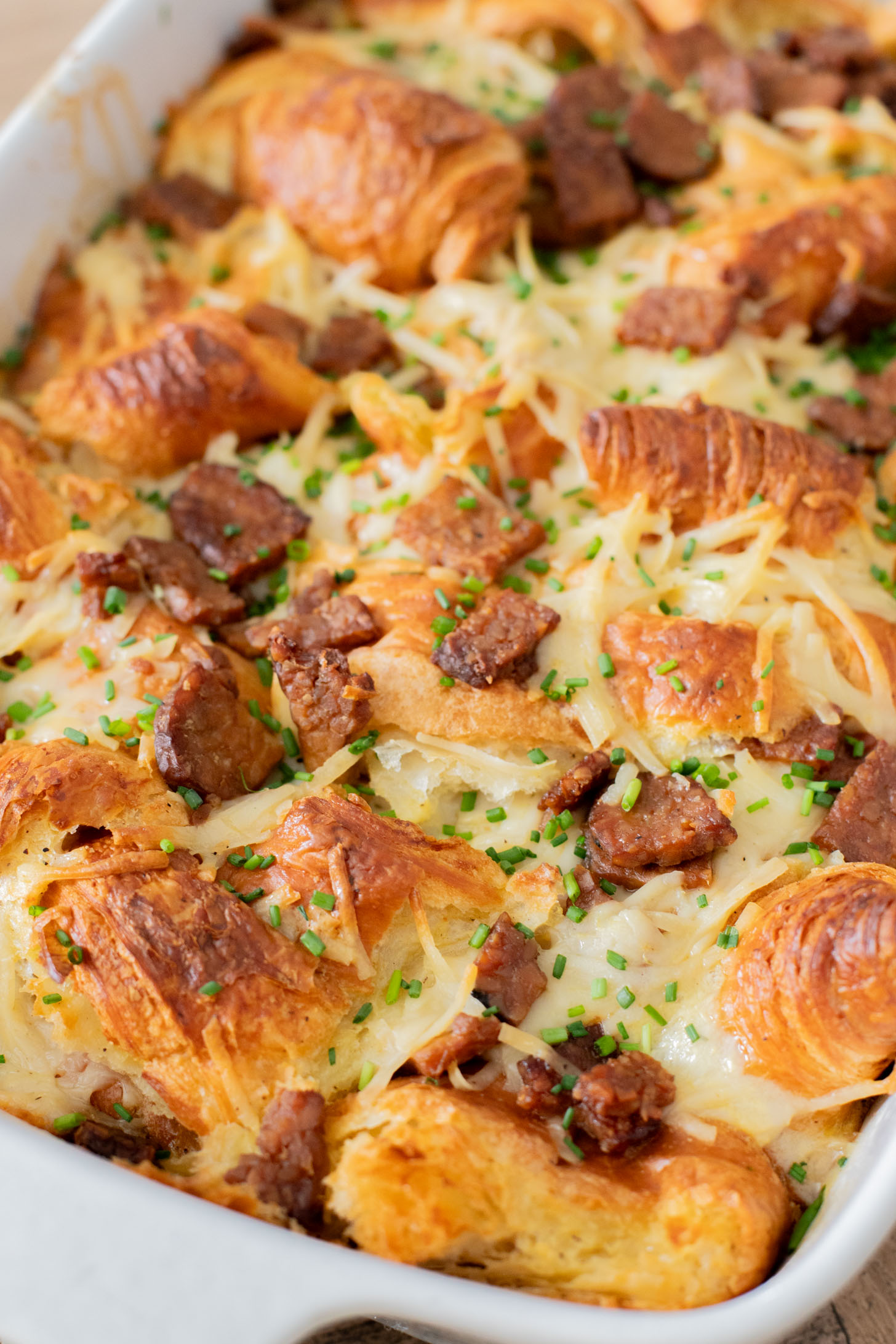 This Vegan Croissant Breakfast Casserole is made with flakey vegan croissants, tempeh bacon and vegan eggs | ThisSavoryVegan.com