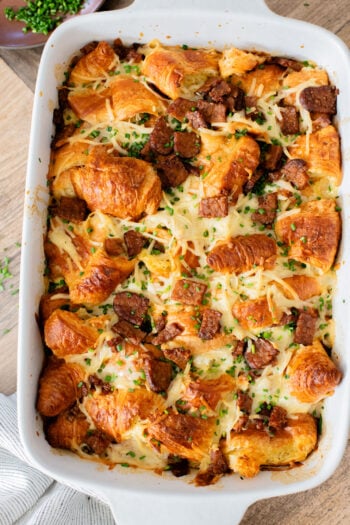 This Vegan Croissant Breakfast Casserole is made with flakey vegan croissants, tempeh bacon and vegan eggs | ThisSavoryVegan.com