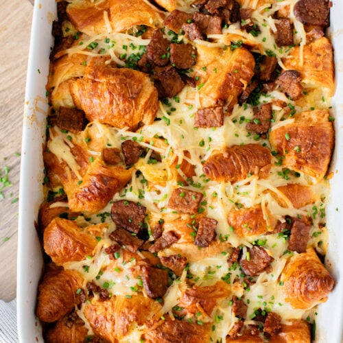 This Vegan Croissant Breakfast Casserole is made with flakey vegan croissants, tempeh bacon and vegan eggs | ThisSavoryVegan.com
