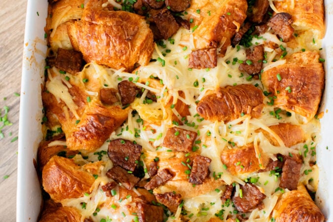 This Vegan Croissant Breakfast Casserole is made with flakey vegan croissants, tempeh bacon and vegan eggs | ThisSavoryVegan.com