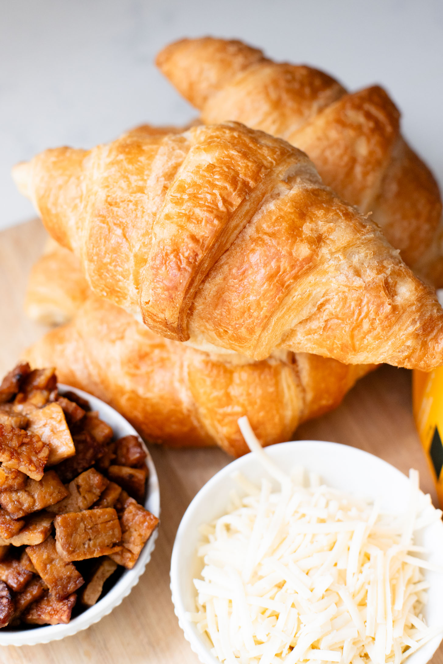 This Vegan Croissant Breakfast Casserole is made with flakey vegan croissants, tempeh bacon and vegan eggs | ThisSavoryVegan.com