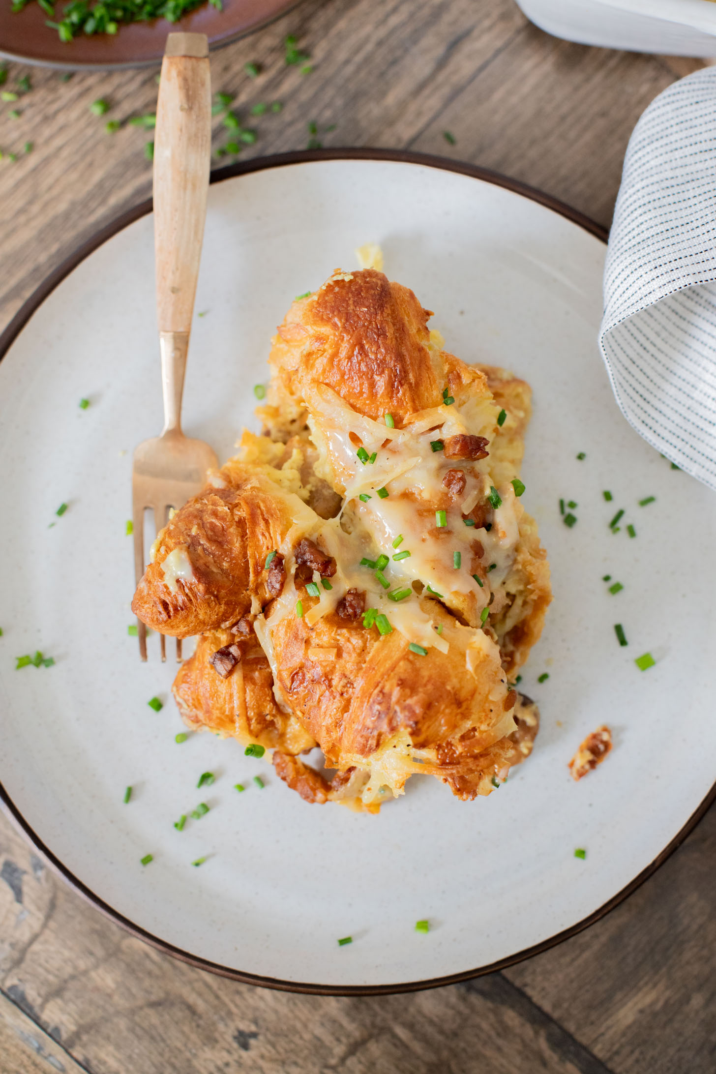 This Vegan Croissant Breakfast Casserole is made with flakey vegan croissants, tempeh bacon and vegan eggs | ThisSavoryVegan.com
