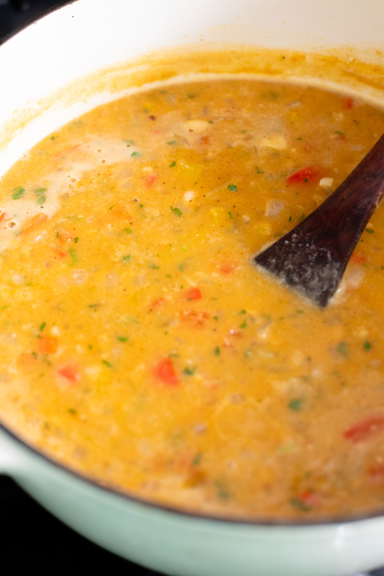 This White Bean Chili is a simple & healthy one-pot dinner! You get a cozy dinner in 30 minutes with very few dishes | ThisSavoryVegan.com