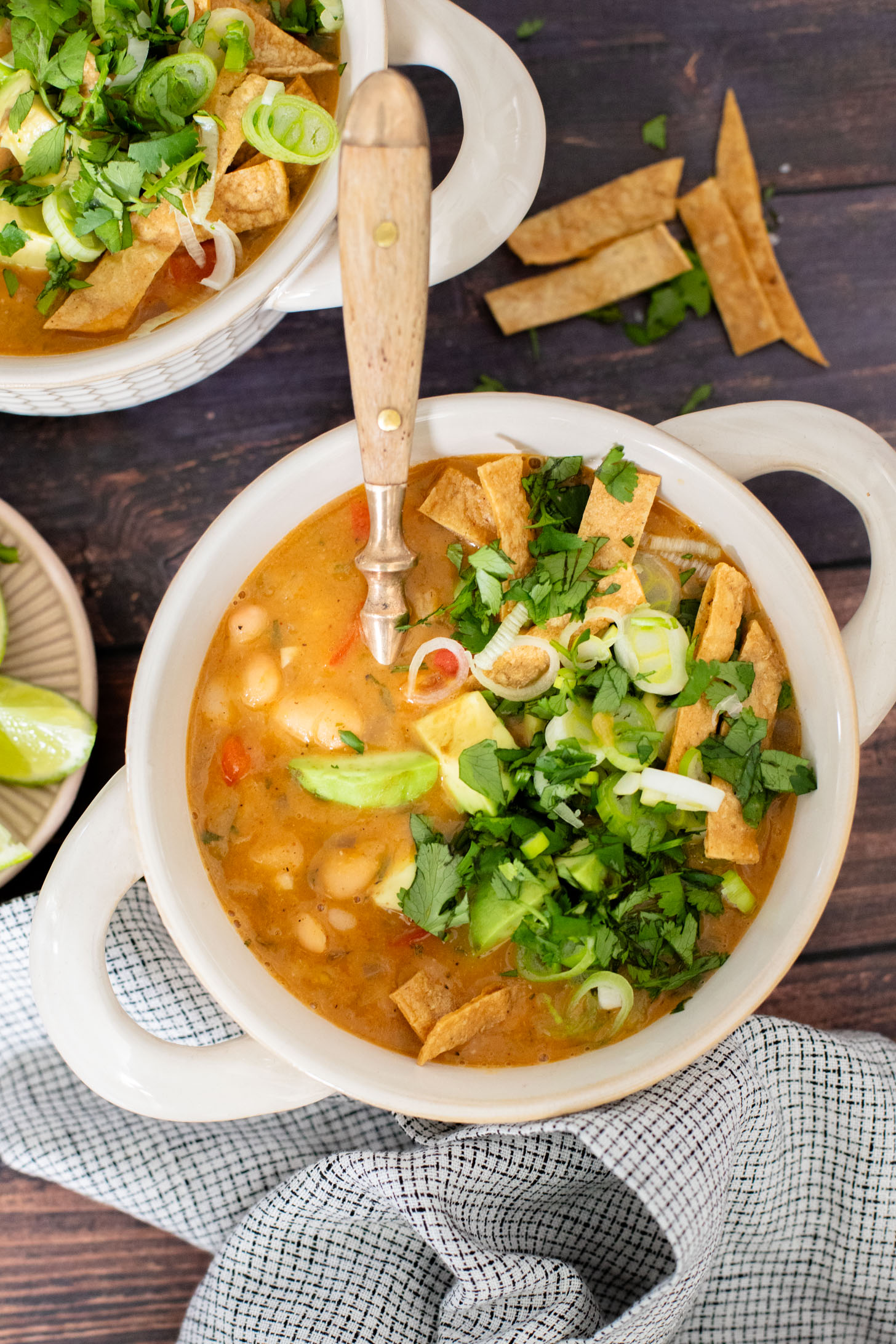 This White Bean Chili is a simple & healthy one-pot dinner! You get a cozy dinner in 30 minutes with very few dishes | ThisSavoryVegan.com