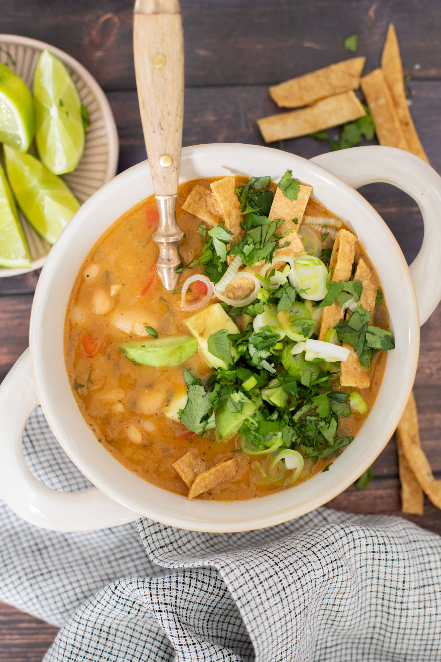 This White Bean Chili is a simple & healthy one-pot dinner! You get a cozy dinner in 30 minutes with very few dishes | ThisSavoryVegan.com