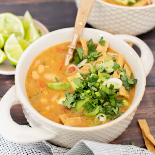 This White Bean Chili is a simple & healthy one-pot dinner! You get a cozy dinner in 30 minutes with very few dishes | ThisSavoryVegan.com